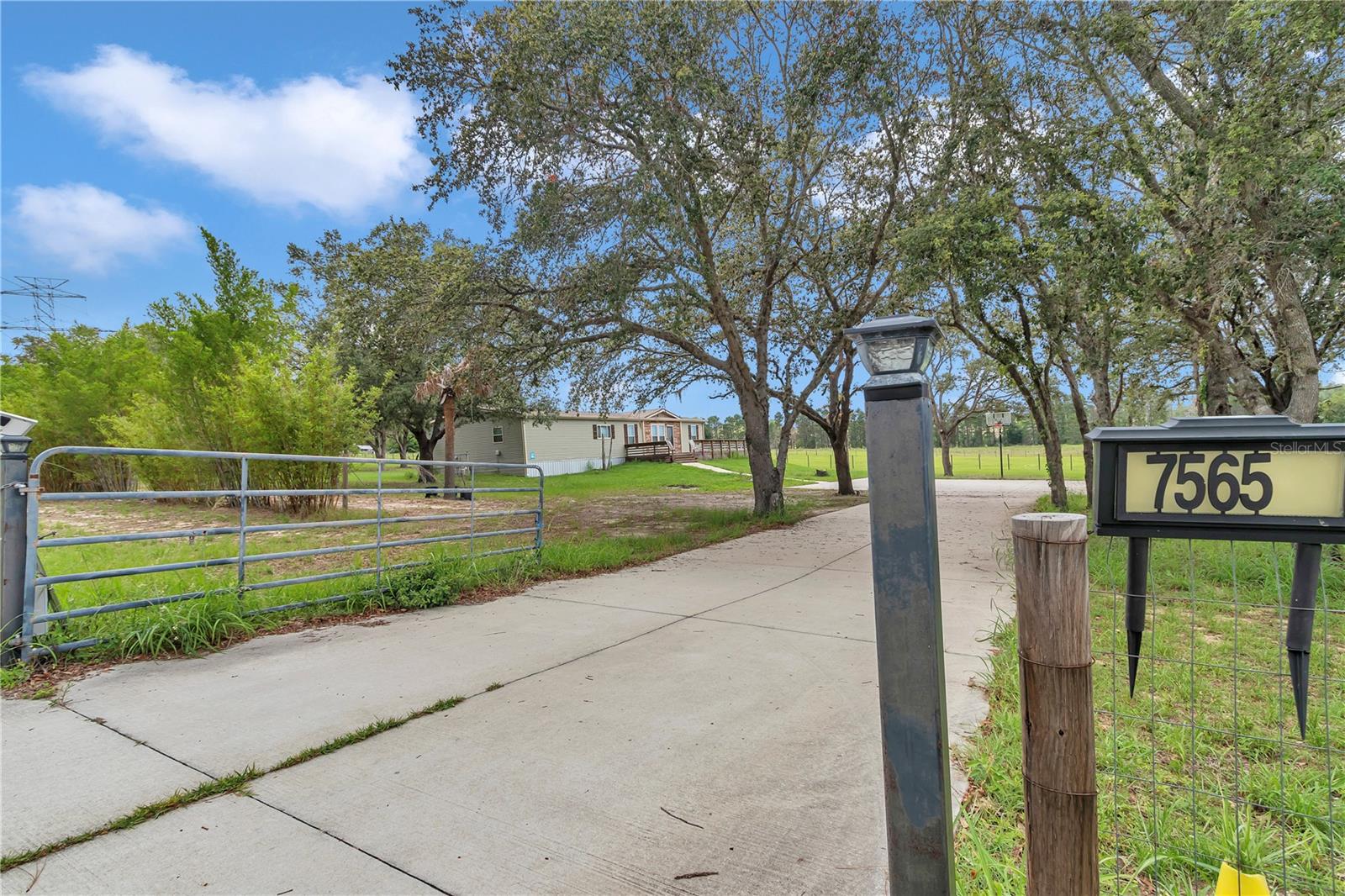 7565 DEWEY ROBBINS RD, HOWEY IN THE HILLS, FL, 34737