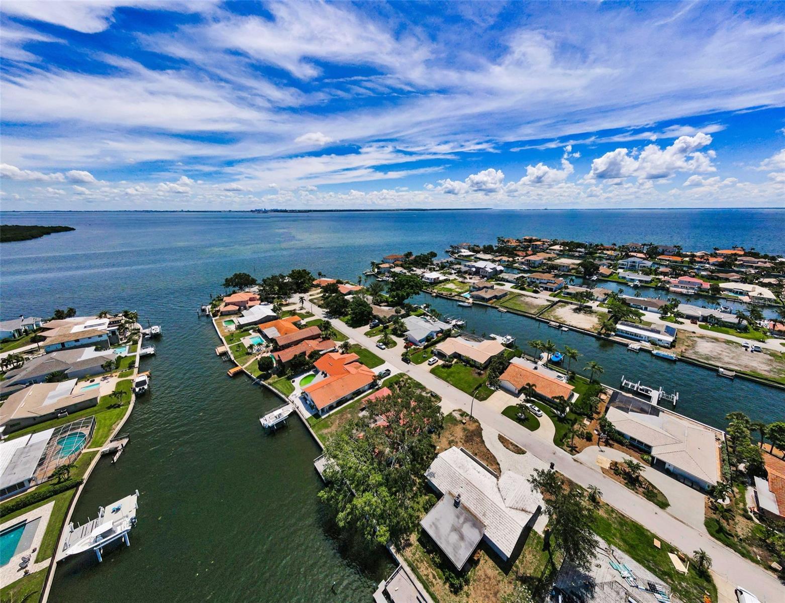 Mature trees line the lot providing shade.