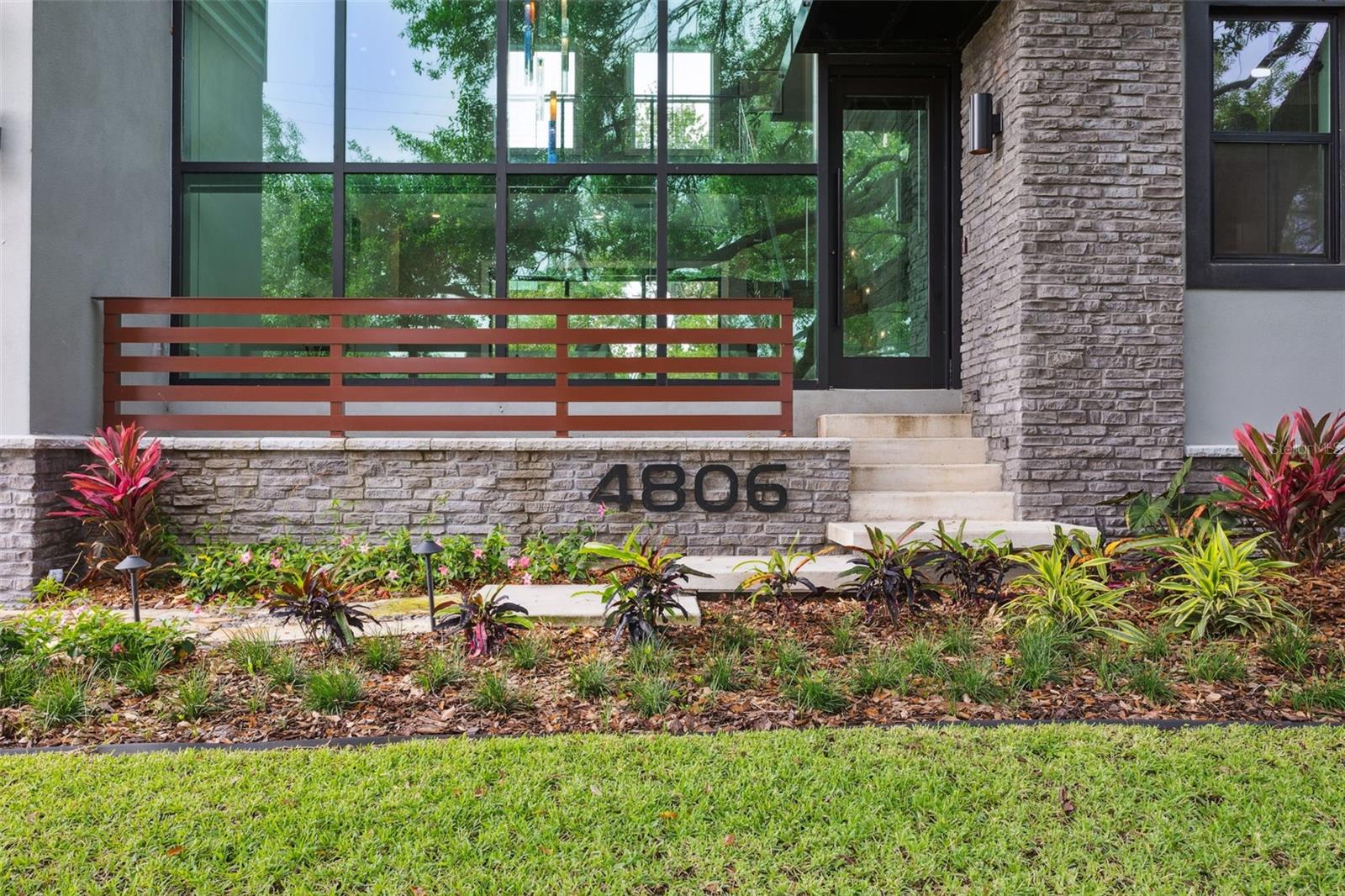 front porch, floor to ceiling windows