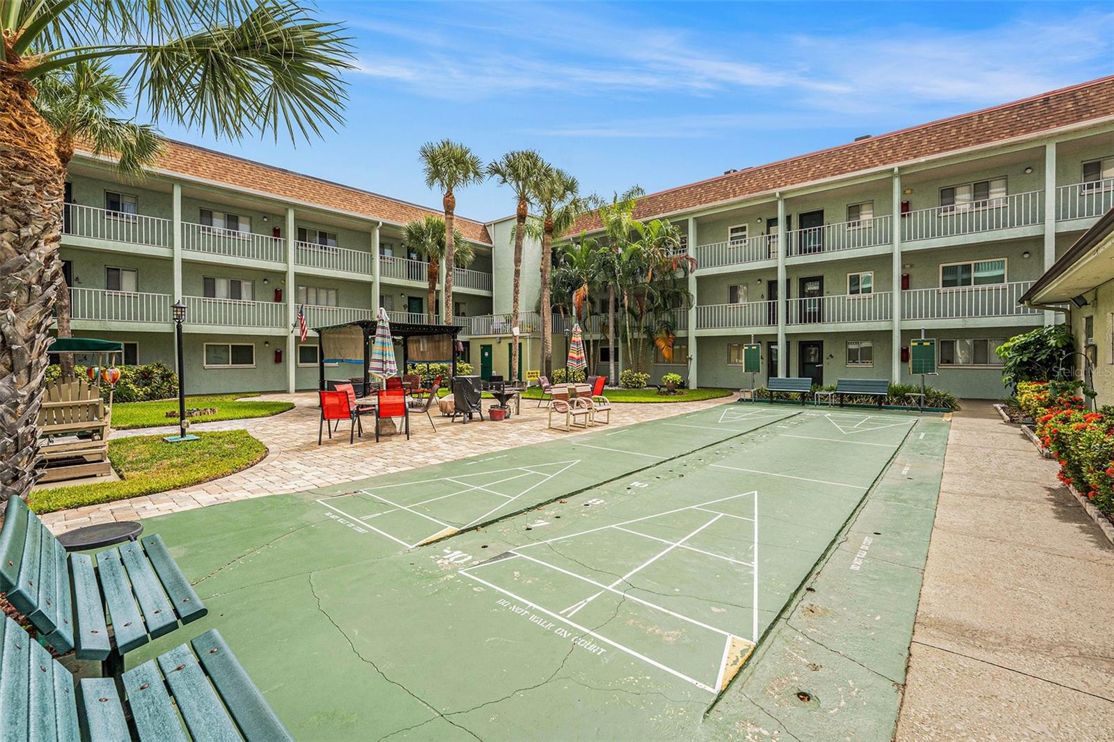 SHUFFLE BOARD & BBQ AREA