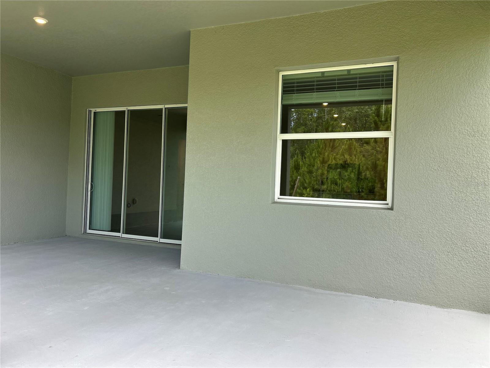Window to Dining Area and Large Lanai Area