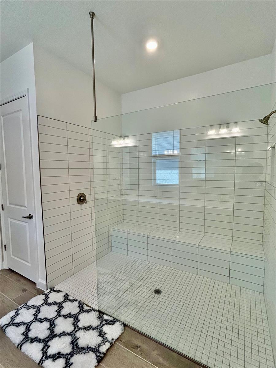 Extra Large Shower w/Wall to Wall Shower Bench & Tile Walls