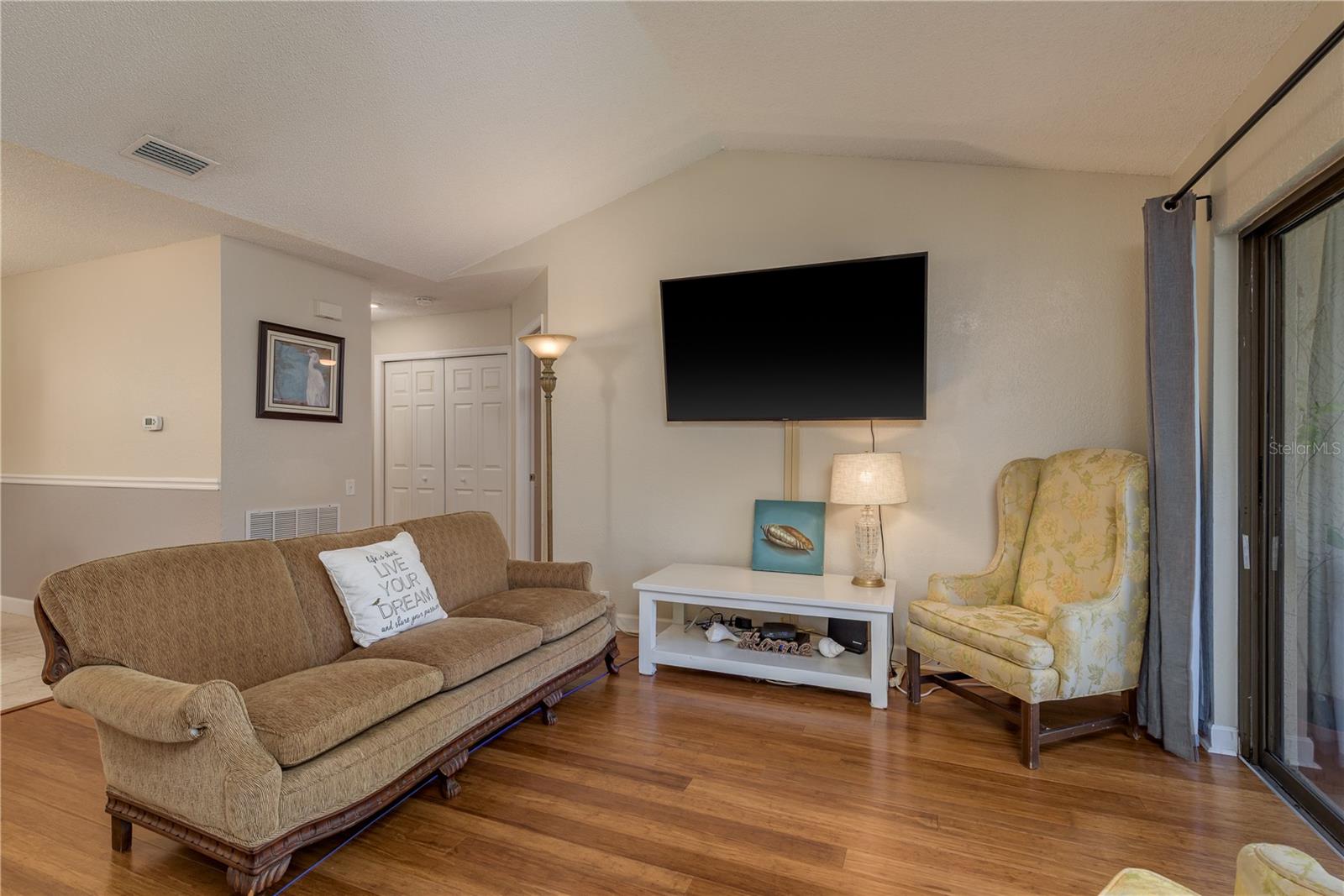 Living room opens to the Balcony for morning Coffee