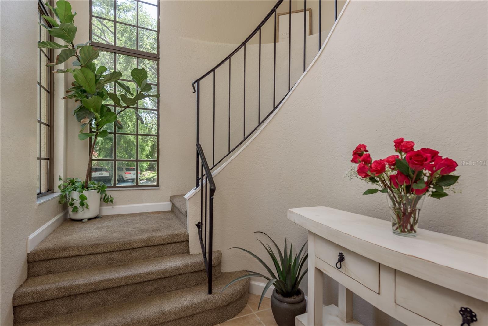 Plenty of Sunlight showcasing the winding staircase