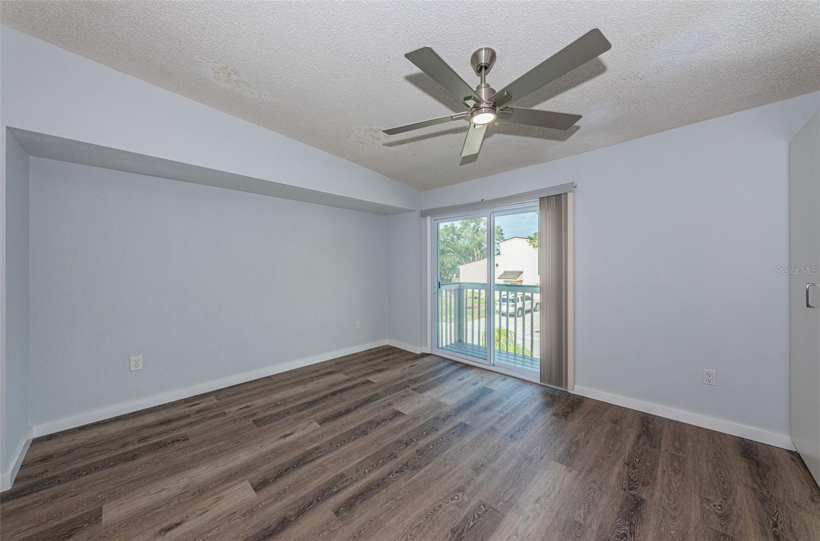 Master bedroom w/ slider to front porch