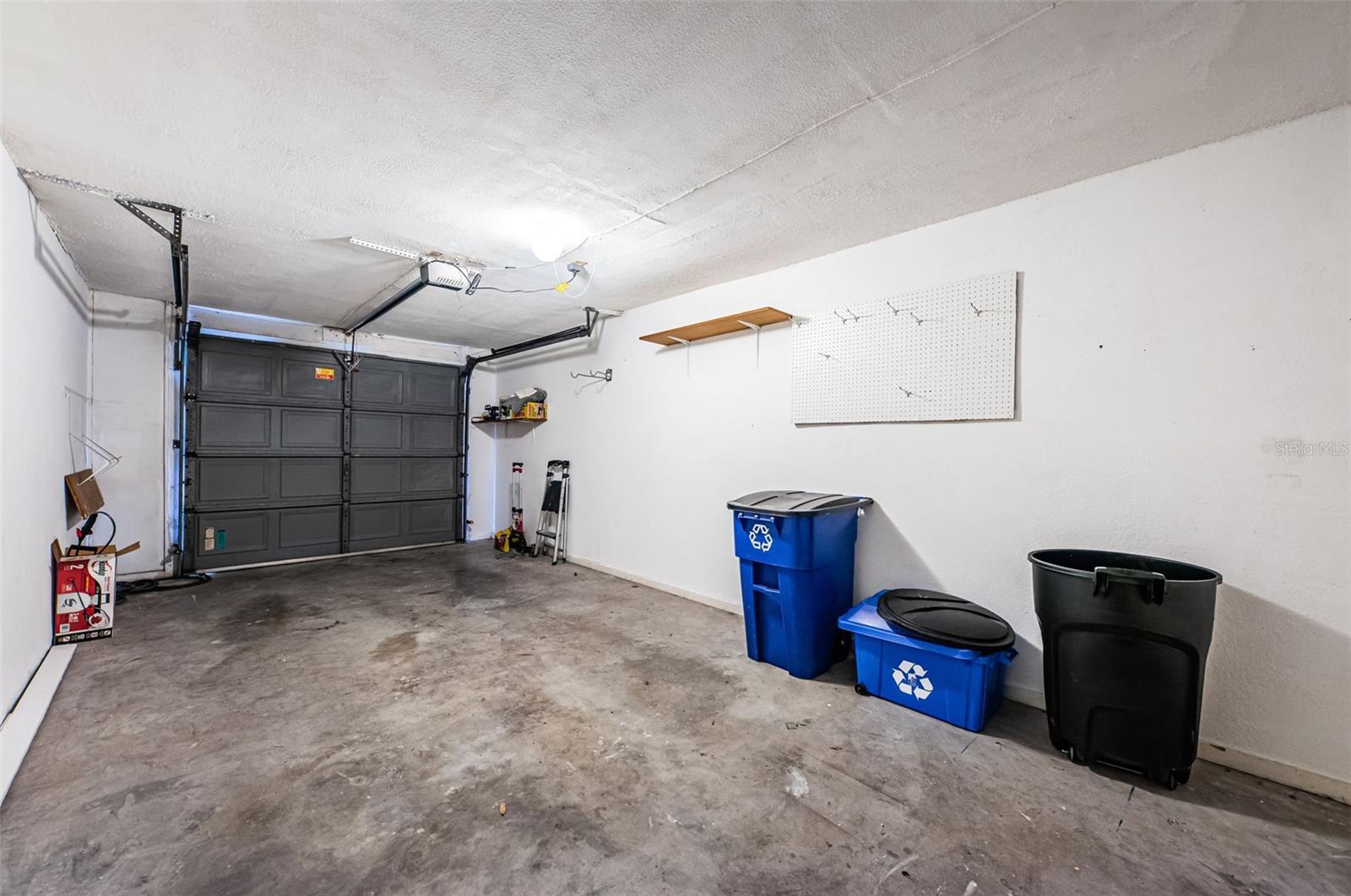 Garage w/ newer opener & springs (floor is now cleaned)