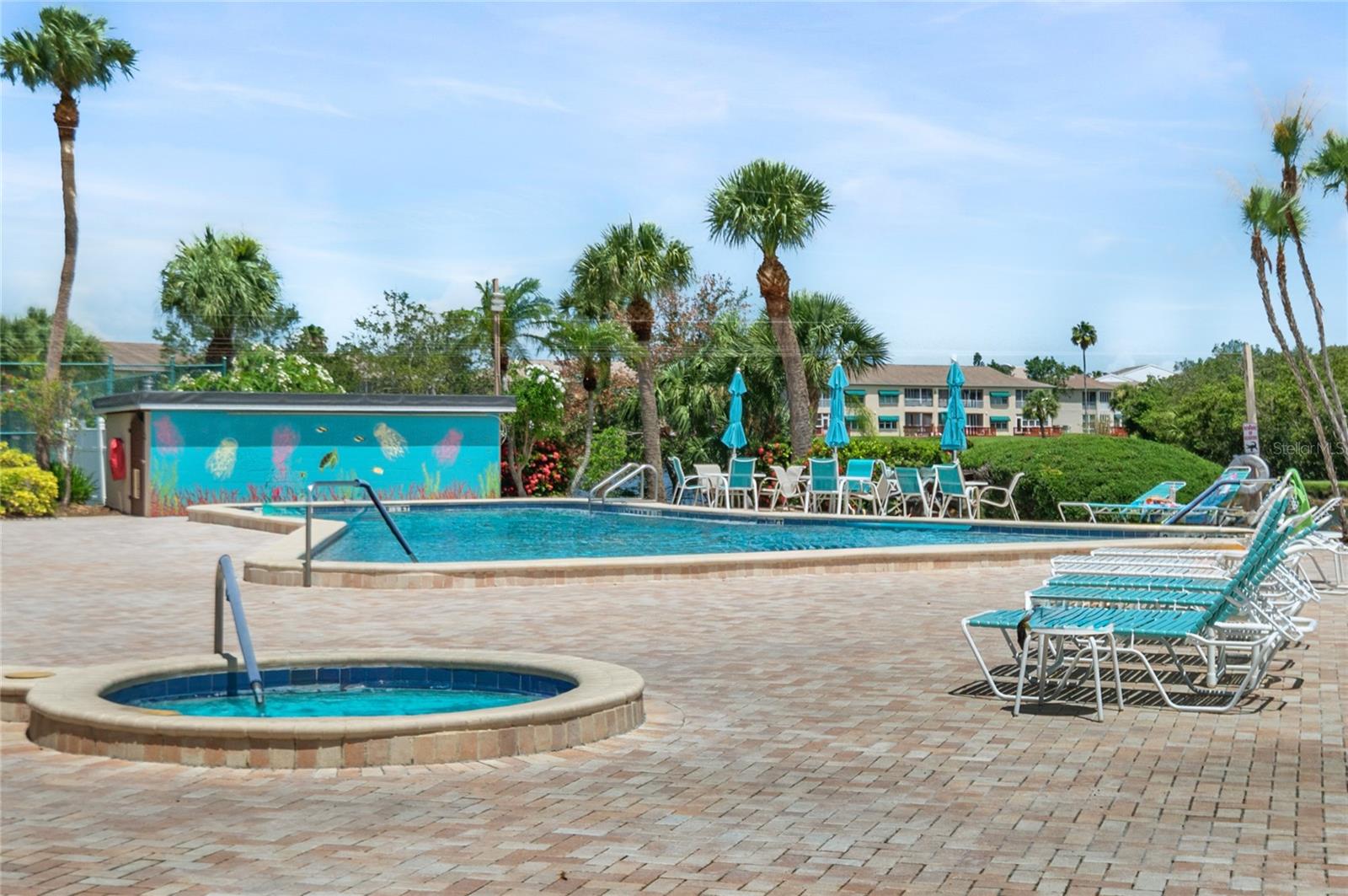 Pool and hot tub between recreation center and the shores of Long Bayou