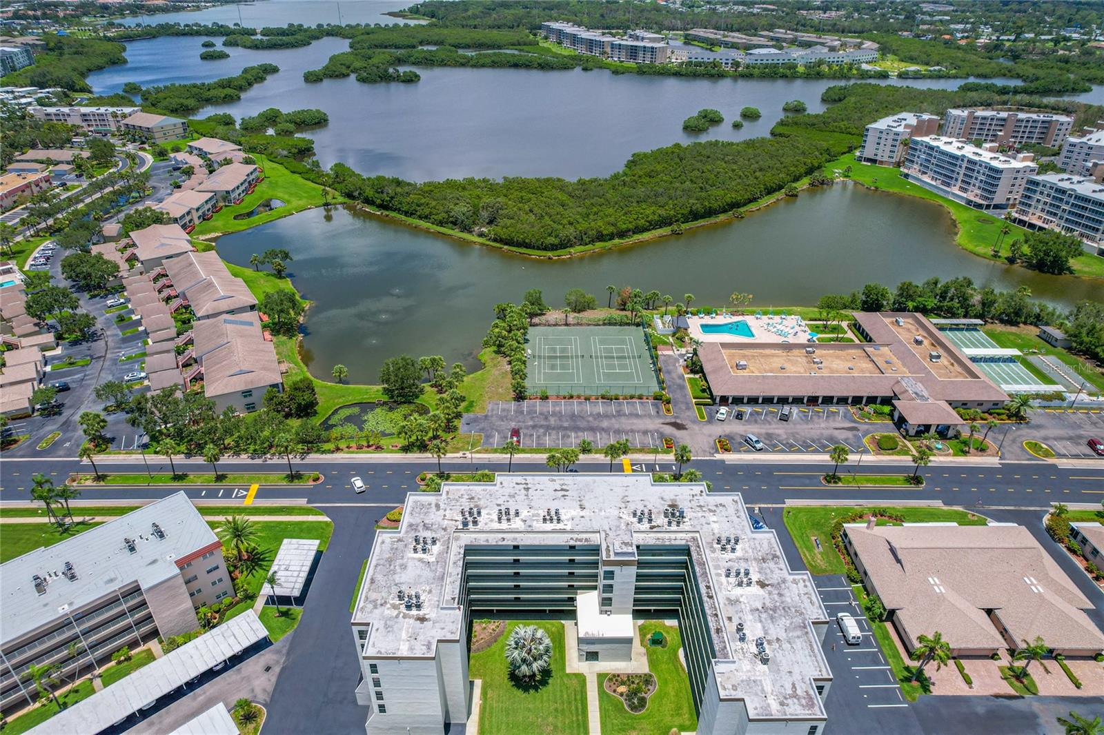 Aerial of Palms of Long Bayou and recreation center (facing north)