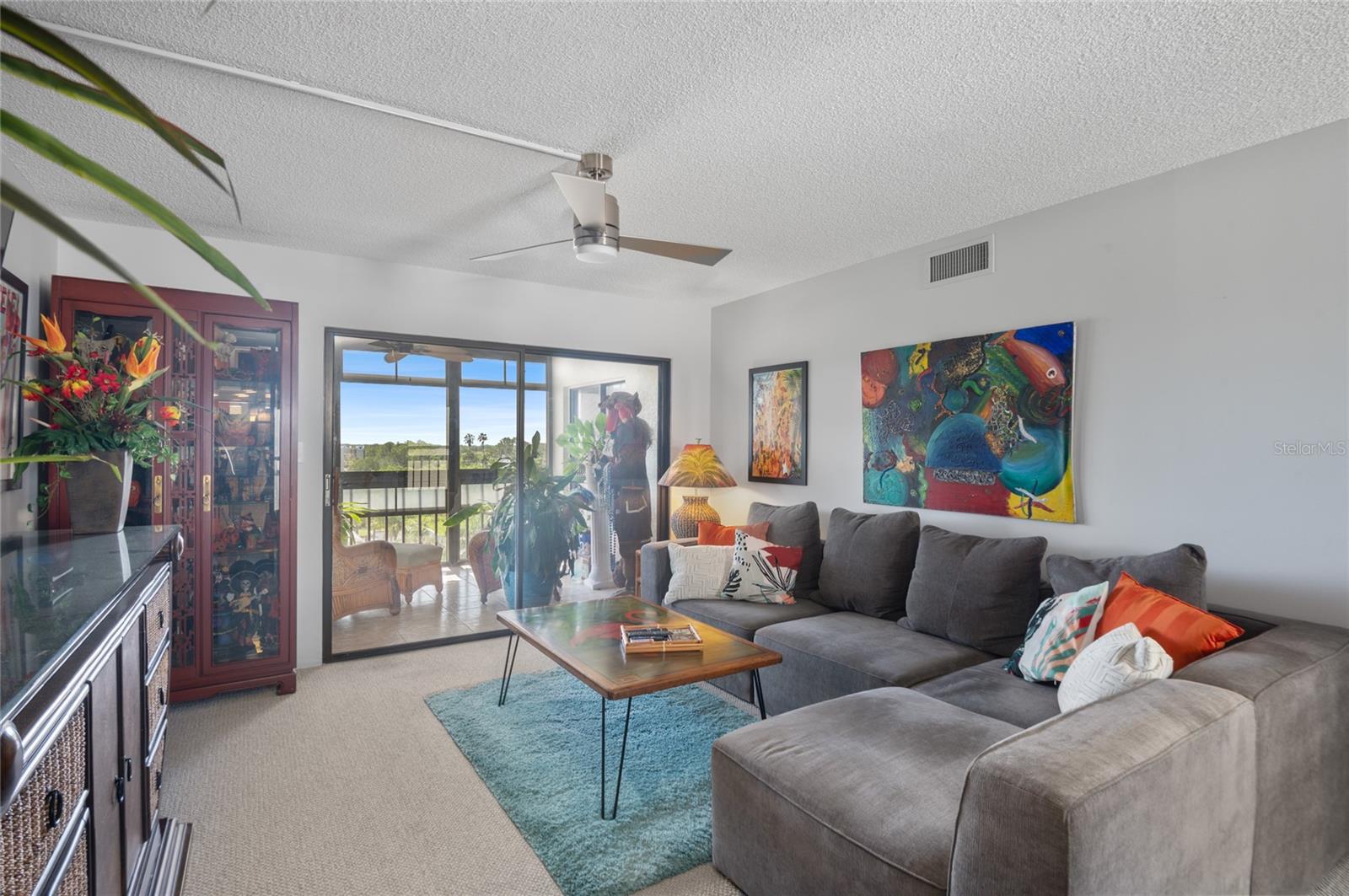 Living room with slider to beautiful lanai