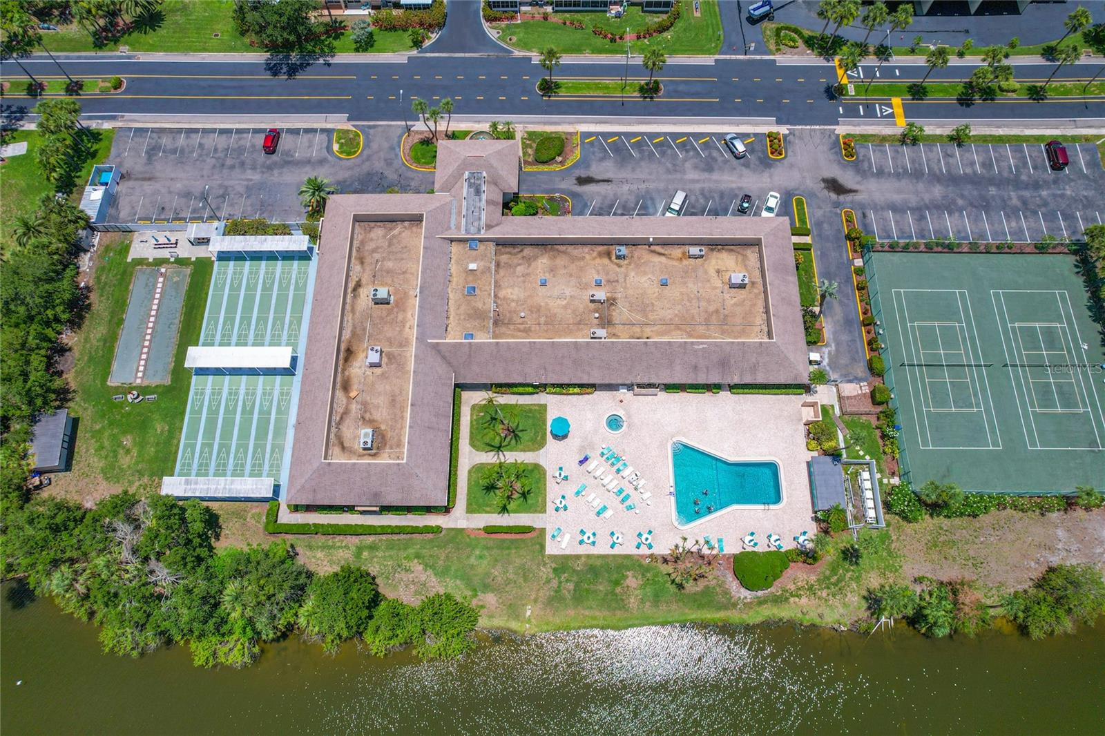 Recreation center, pool and hot tub, 12 shuffleboard courts, 2 bocce lanes, 2 tennis/pickleball courts...all nestle along Long Bayou