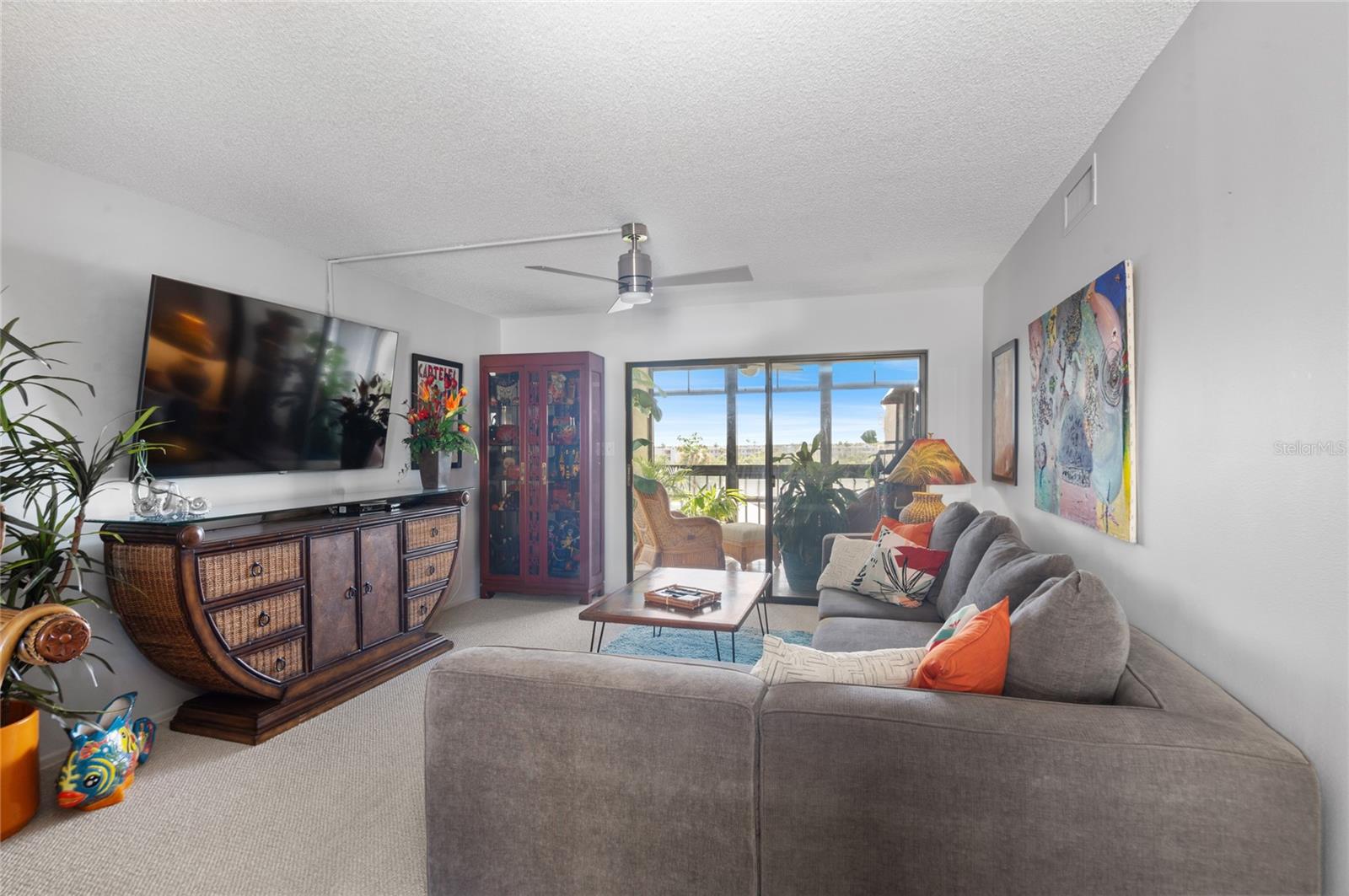 Living room with slider to beautiful lanai