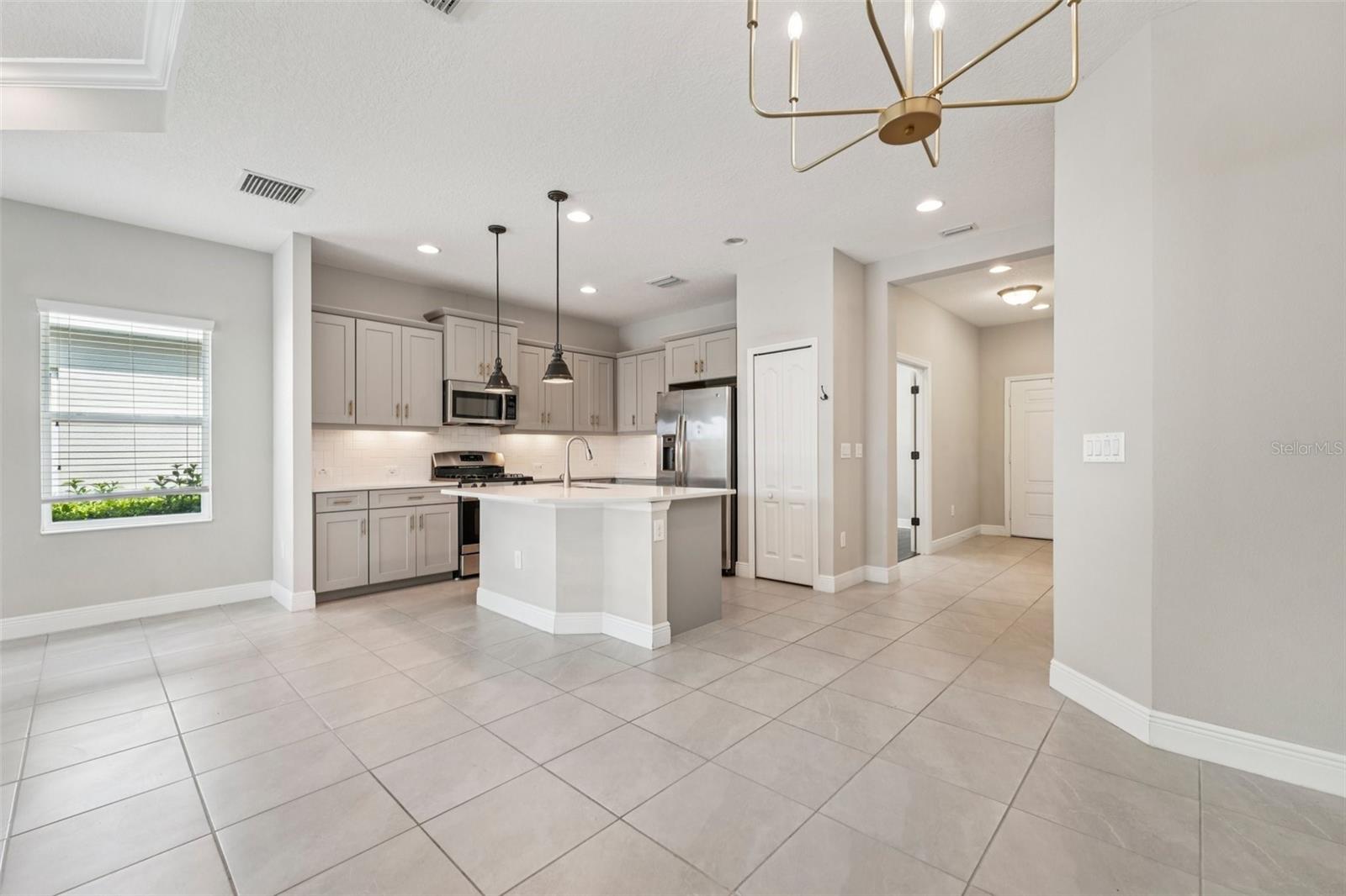 THE FAMILY CHEF WILL LOVE THE GAS STOVE AND SPACIOUS ISLAND!