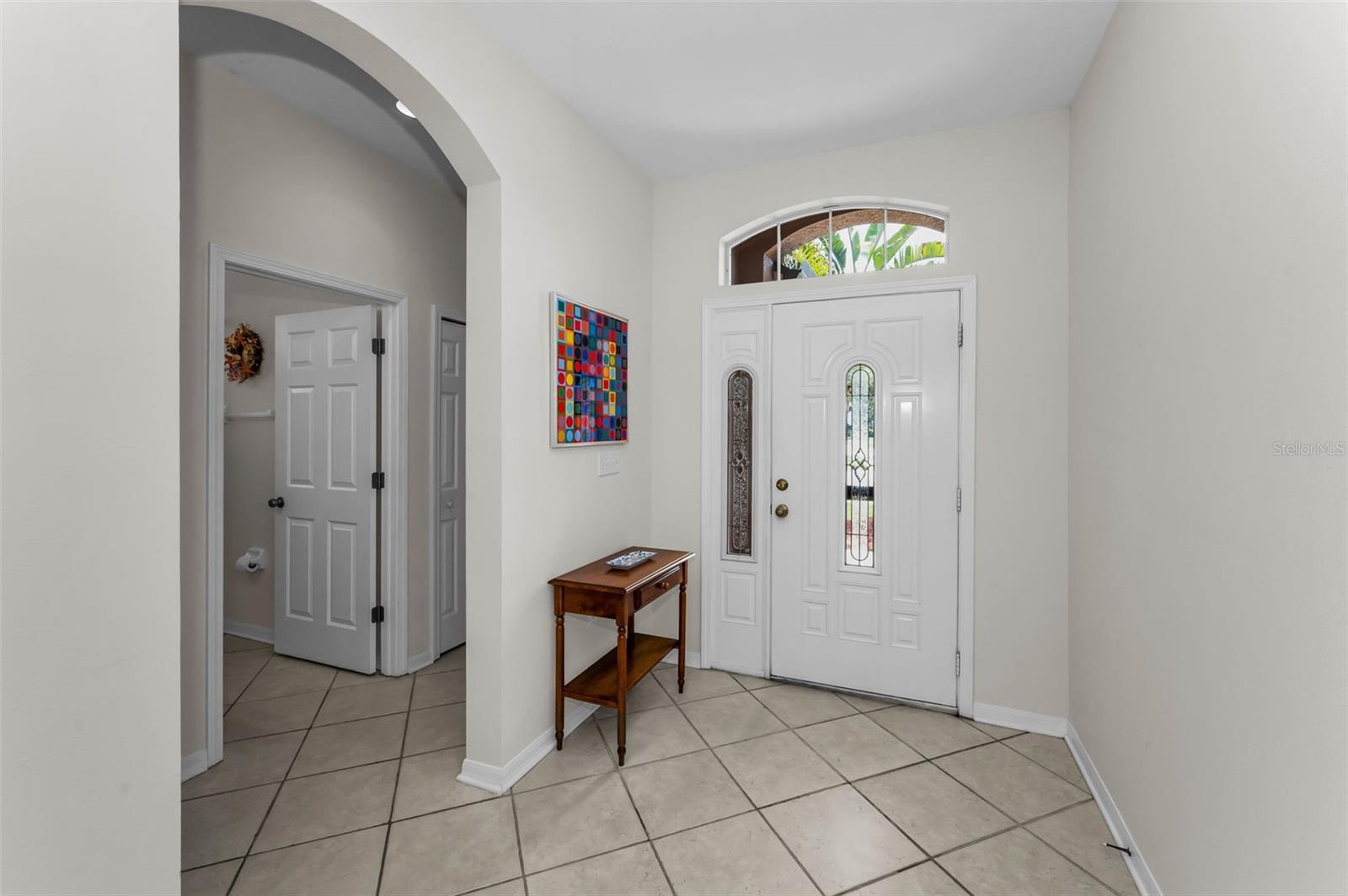 LARGE ENTRY FOYER-HALLWAY TO 2/3 BR'S & MAIN BATH