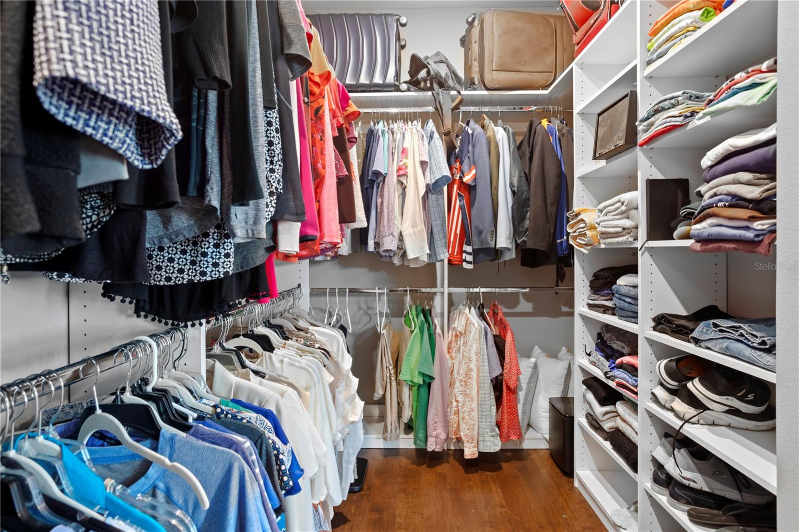 Master bedroom walk-in closet. Room for days...