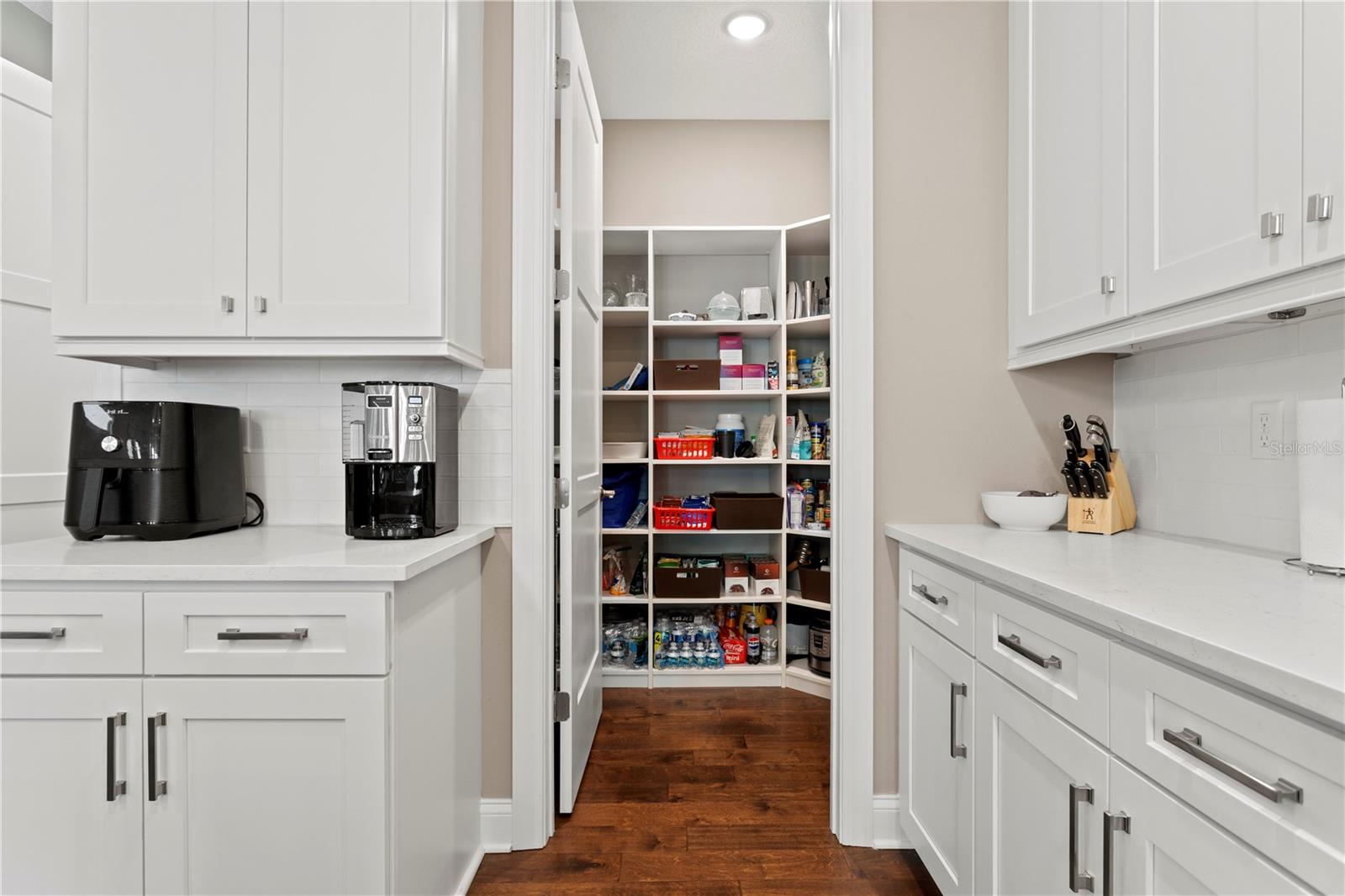 Wow Walk-in Pantry to die for. Coffee bar to.