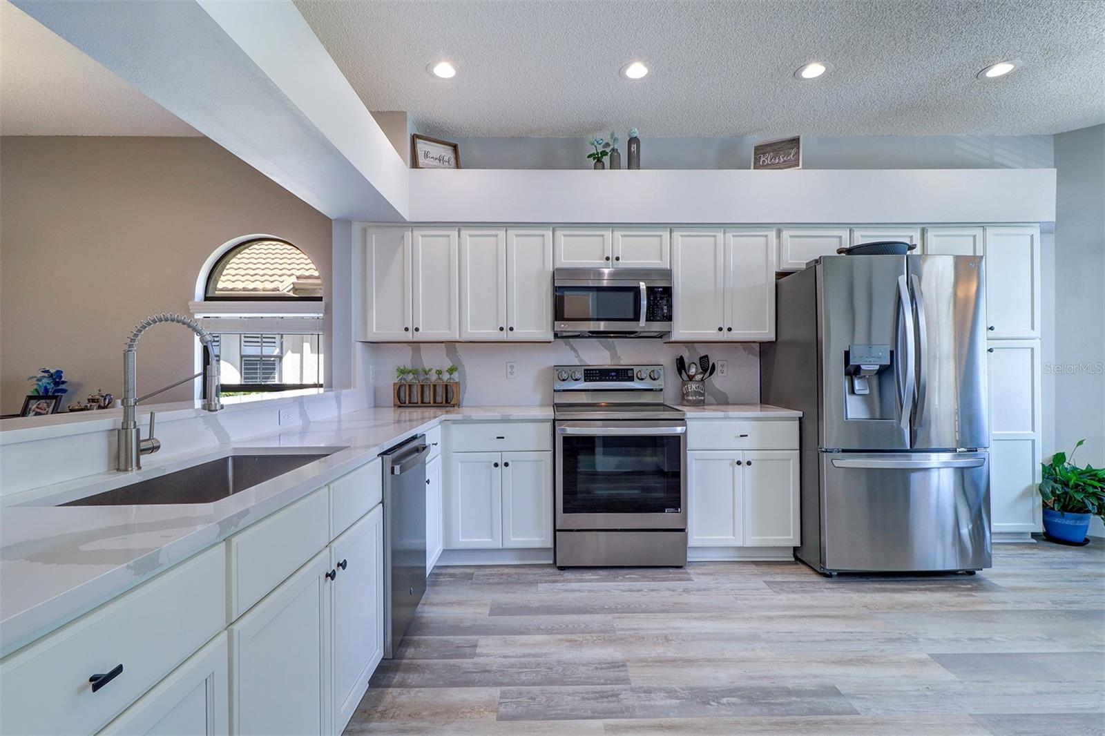 Inside photo of kitchen showing appliance locations