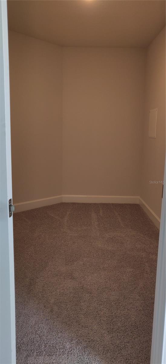 Primary Walk in Closet will have shelving.
