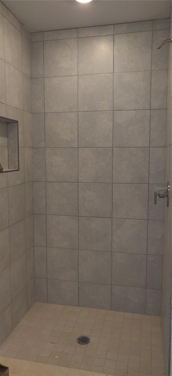Primary shower will have glass doors.