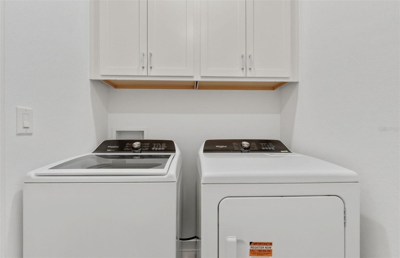 Laundry Room w/Whirlpool washer and dryer