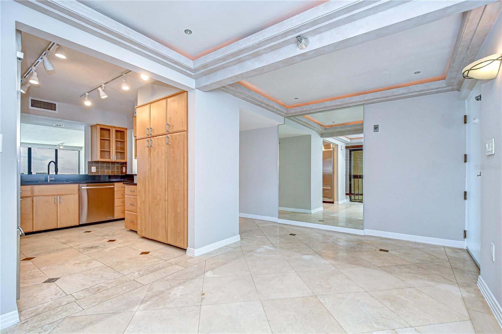 Elegant dining with natural stone tile floors!