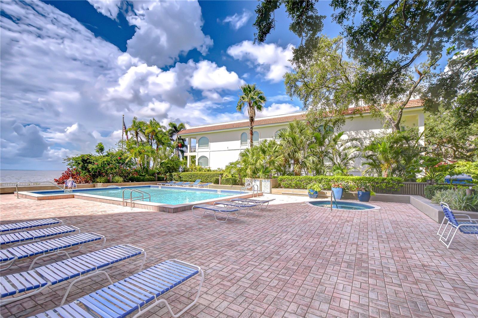 Resort-style amenities include a bayside pool and spa with panoramic views!