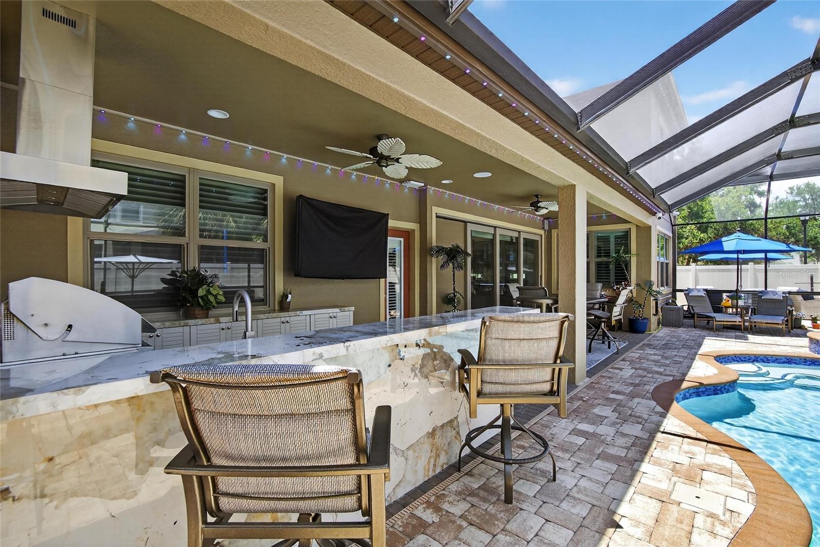 Pool area with Outdoor Kitchen