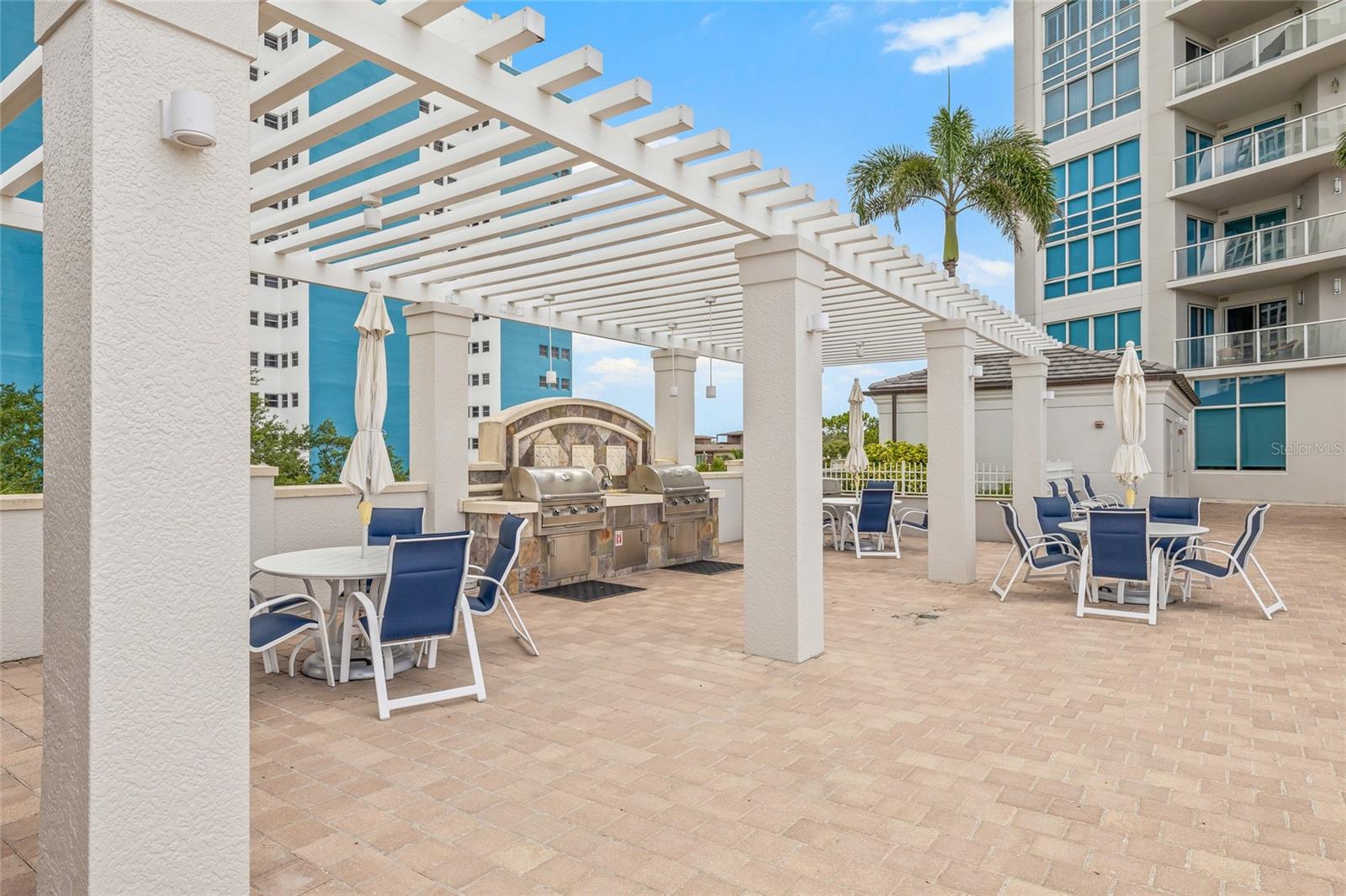 Host with ease at the outdoor grilling area with seating.