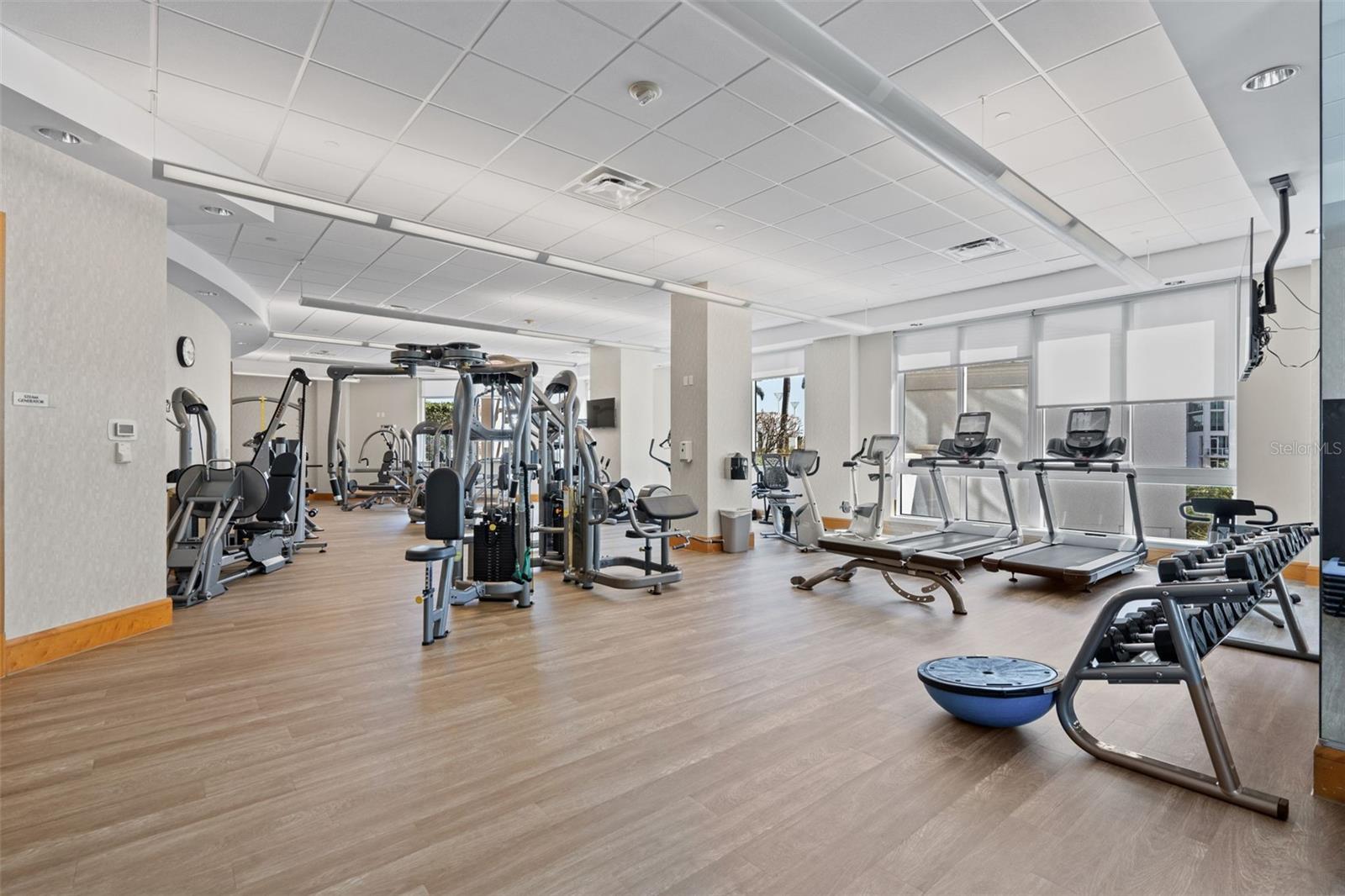 Fitness center with cardio machines, weights, and more.