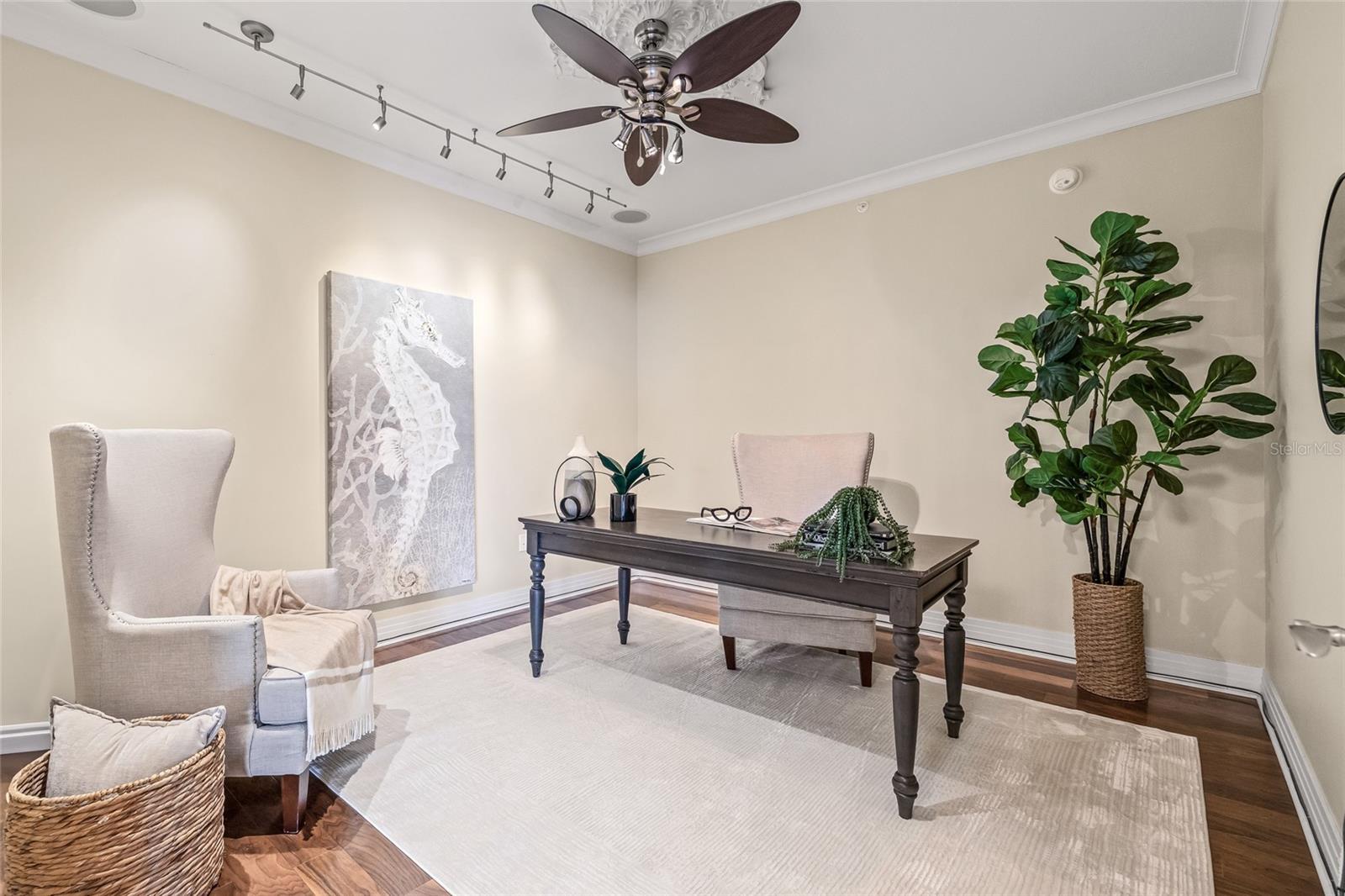 The dedicated office offers flexibility as a media room or den—perfect for guests or working from home.