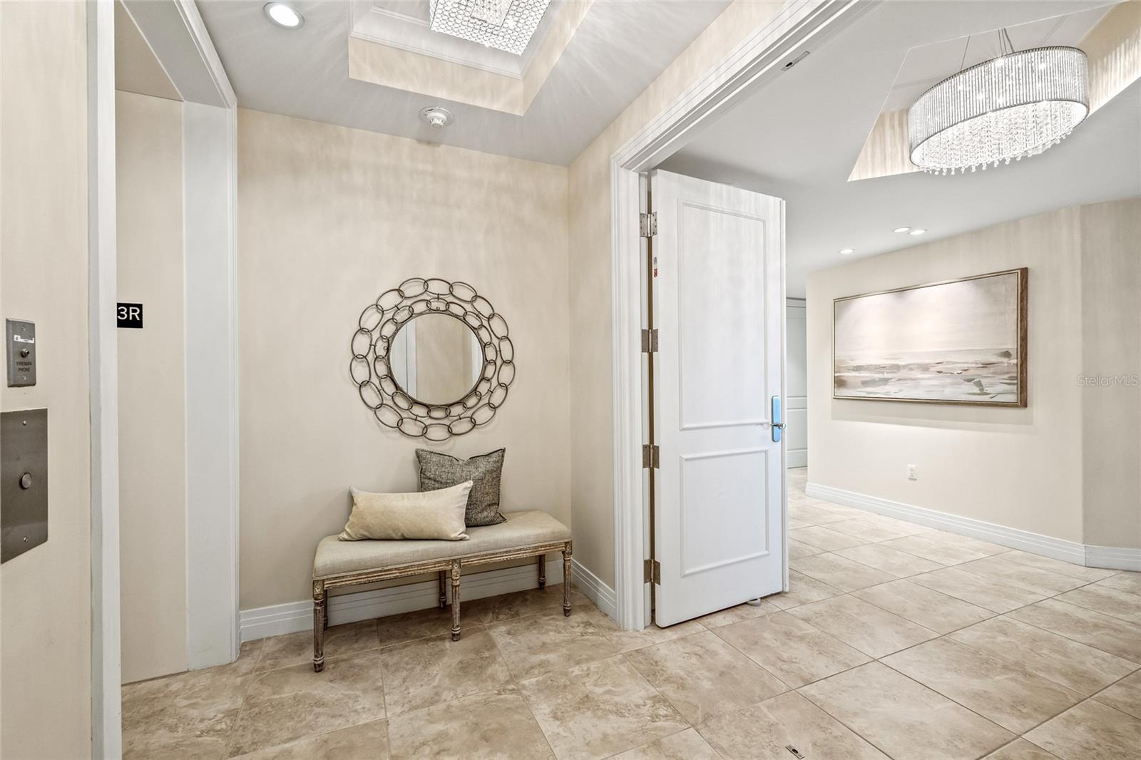 Step off the elevator into your private foyer.