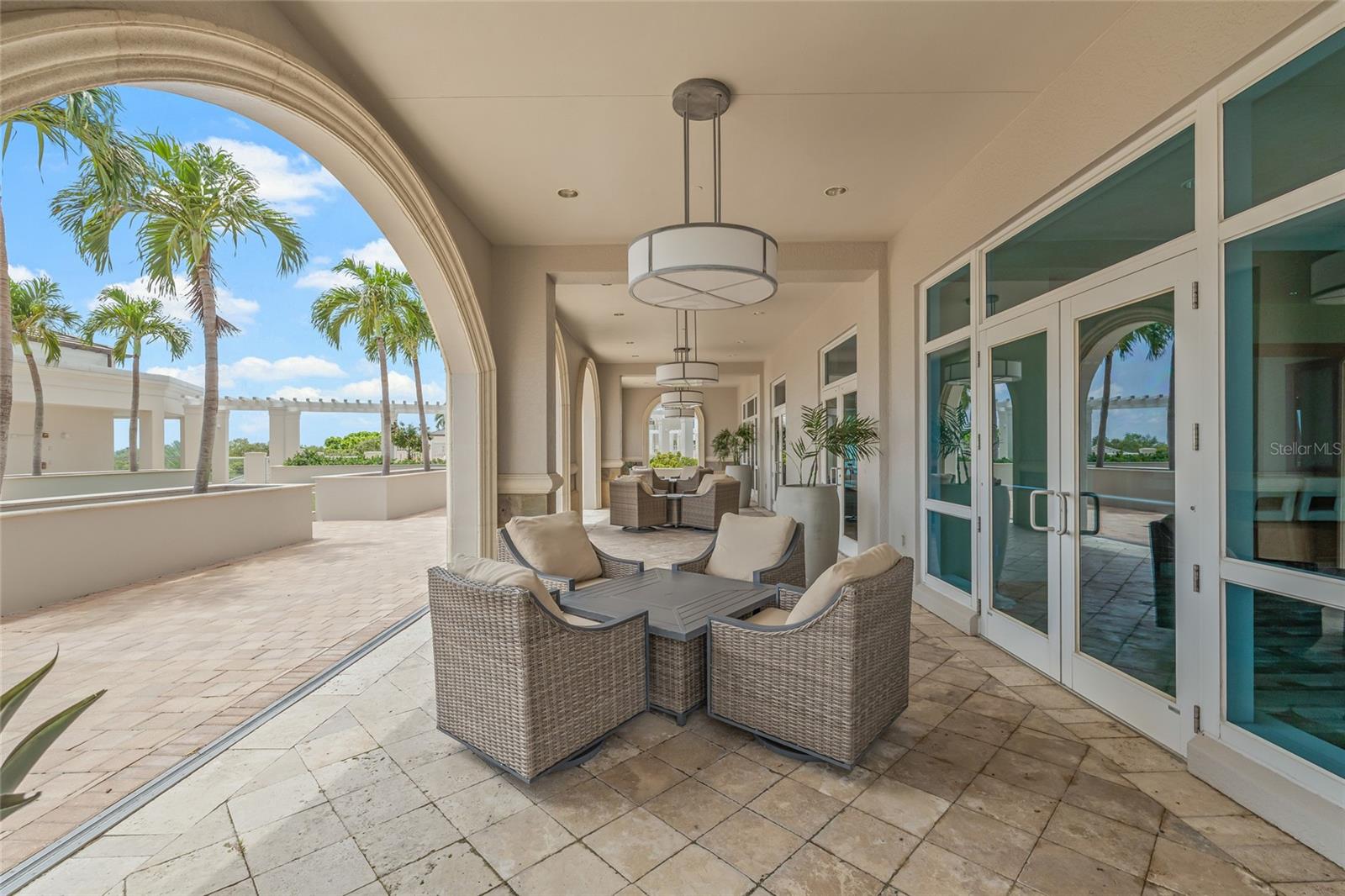 Covered outdoor dining area just off the social room.