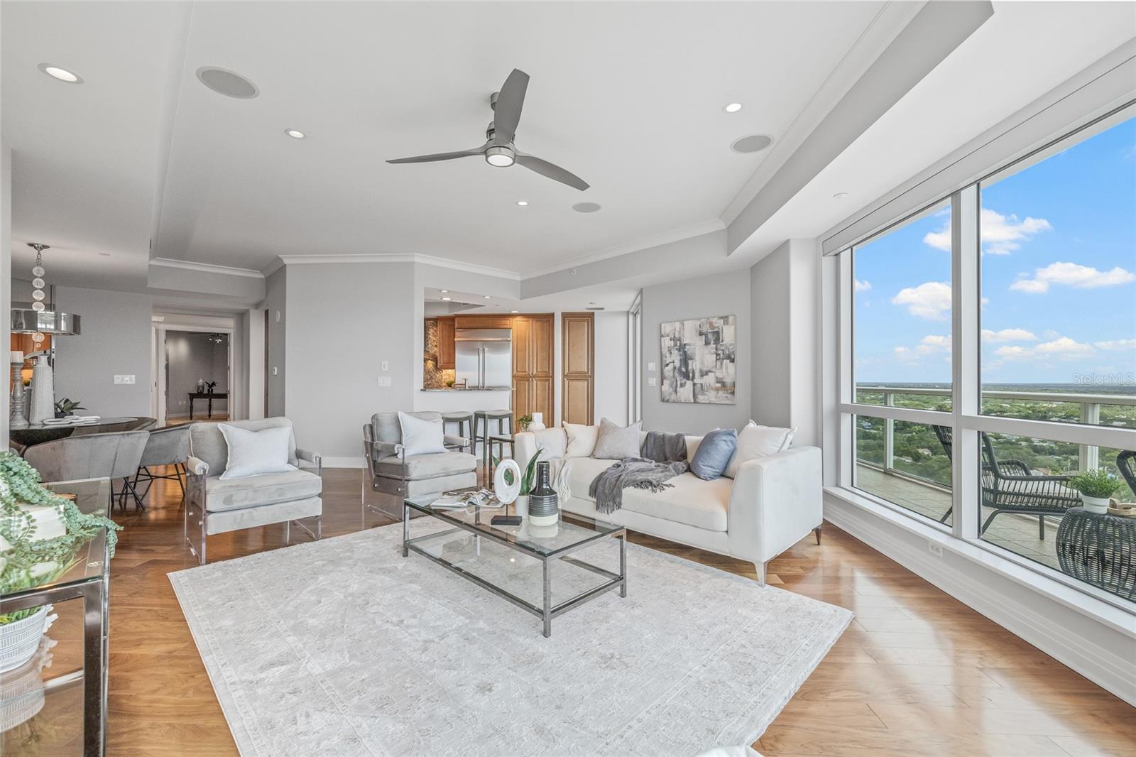 Seamless flow between the living room, kitchen, and dining areas.