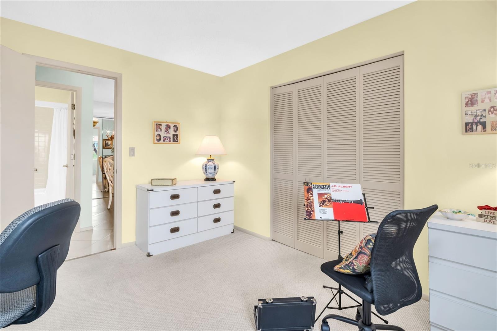 Perfectly located by the hall bath between the main living & front entry~