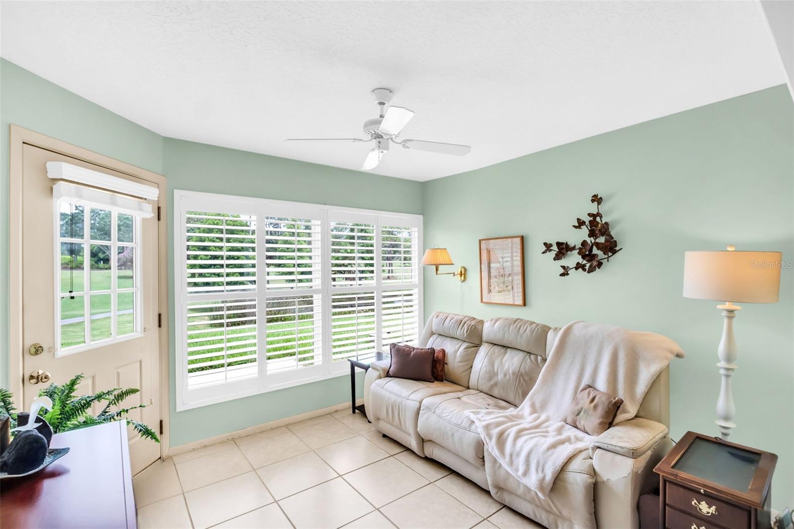 Fully enclosed Florida room with HVAC to enjoy year-round~