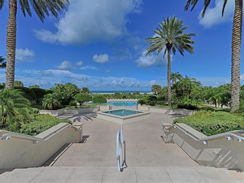 The most resort-style complex on Sand Key and the emerald waters of the Gulf beyond.