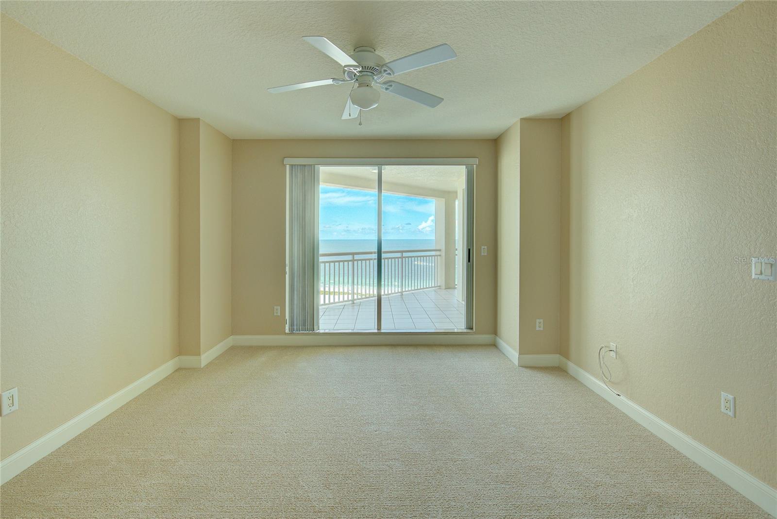 the primary suite is large enough for a king-sized bed plus, plus....with beautiful wake-up views of the gulf.