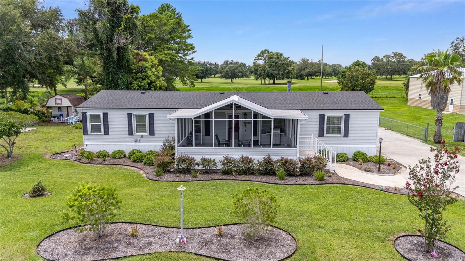 7706 COUNTY ROAD 109D, LADY LAKE, FL, 32159