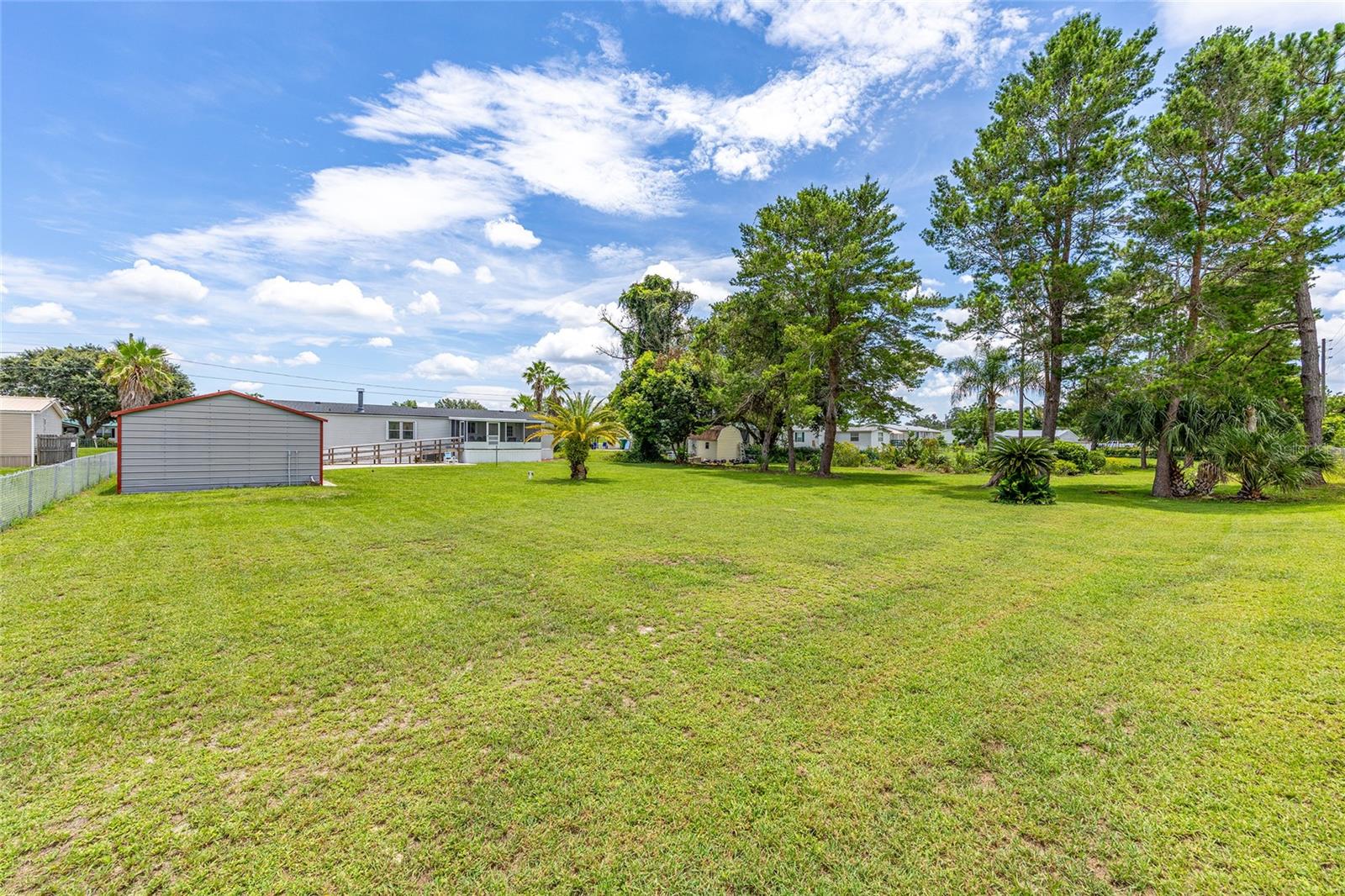 7706 COUNTY ROAD 109D, LADY LAKE, FL, 32159