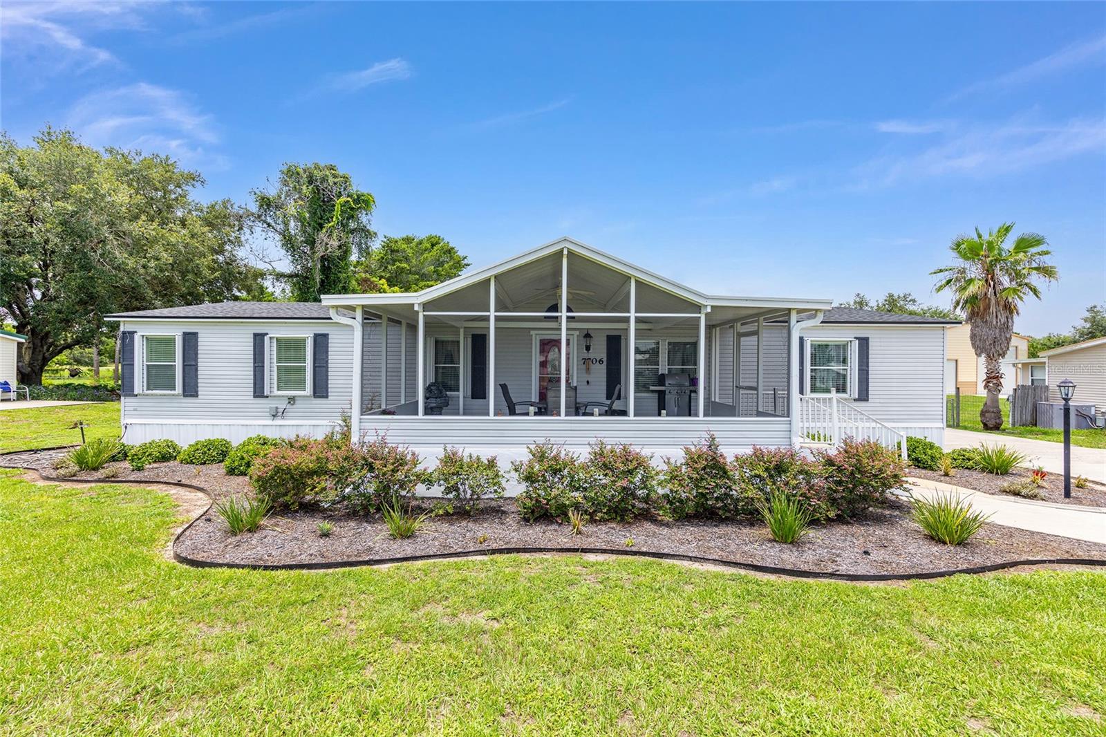 7706 COUNTY ROAD 109D, LADY LAKE, FL, 32159
