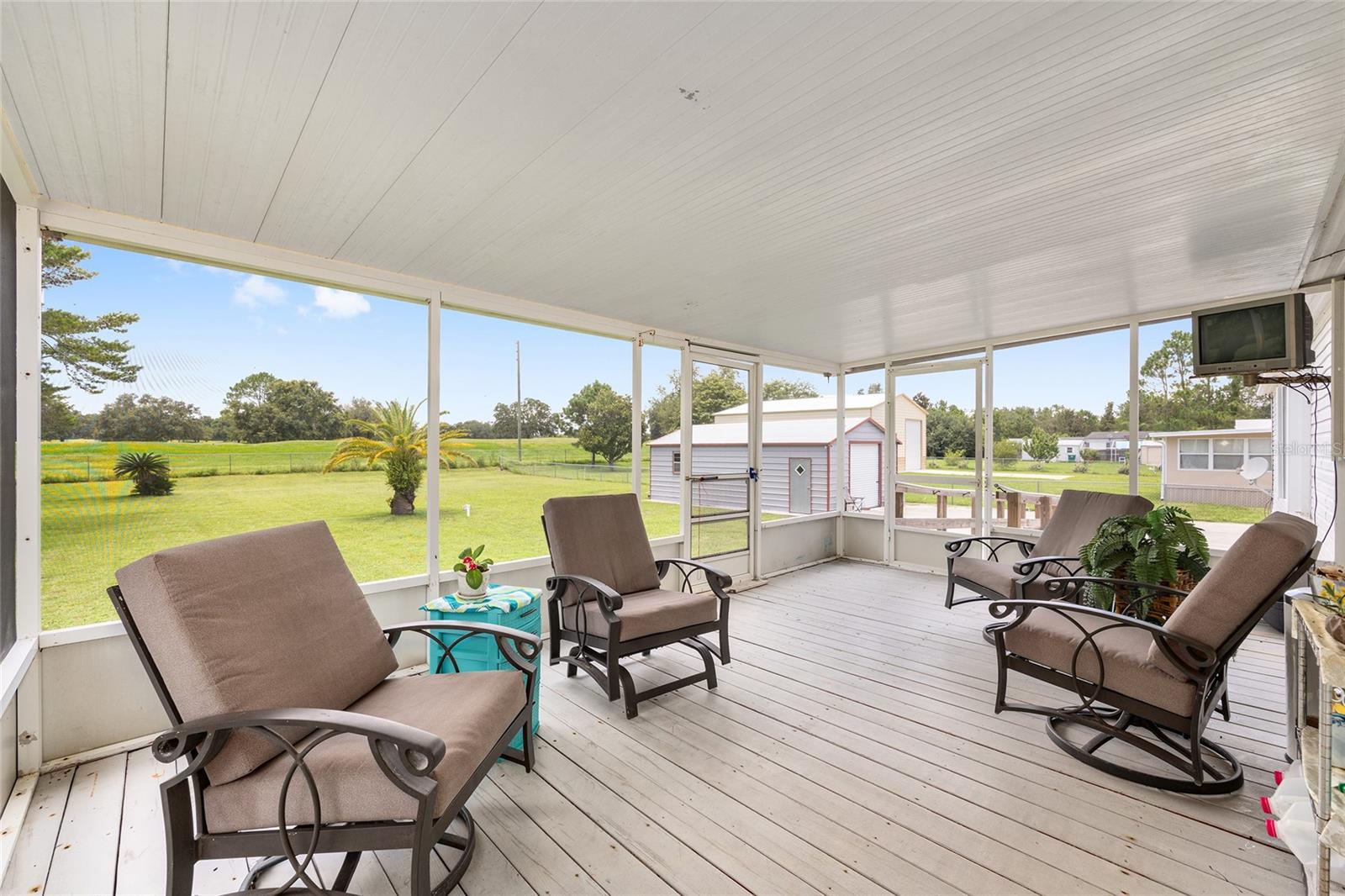 7706 COUNTY ROAD 109D, LADY LAKE, FL, 32159