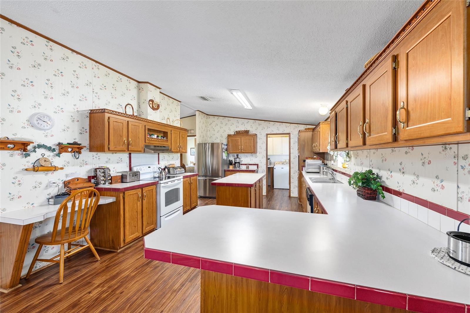 7706 COUNTY ROAD 109D, LADY LAKE, FL, 32159