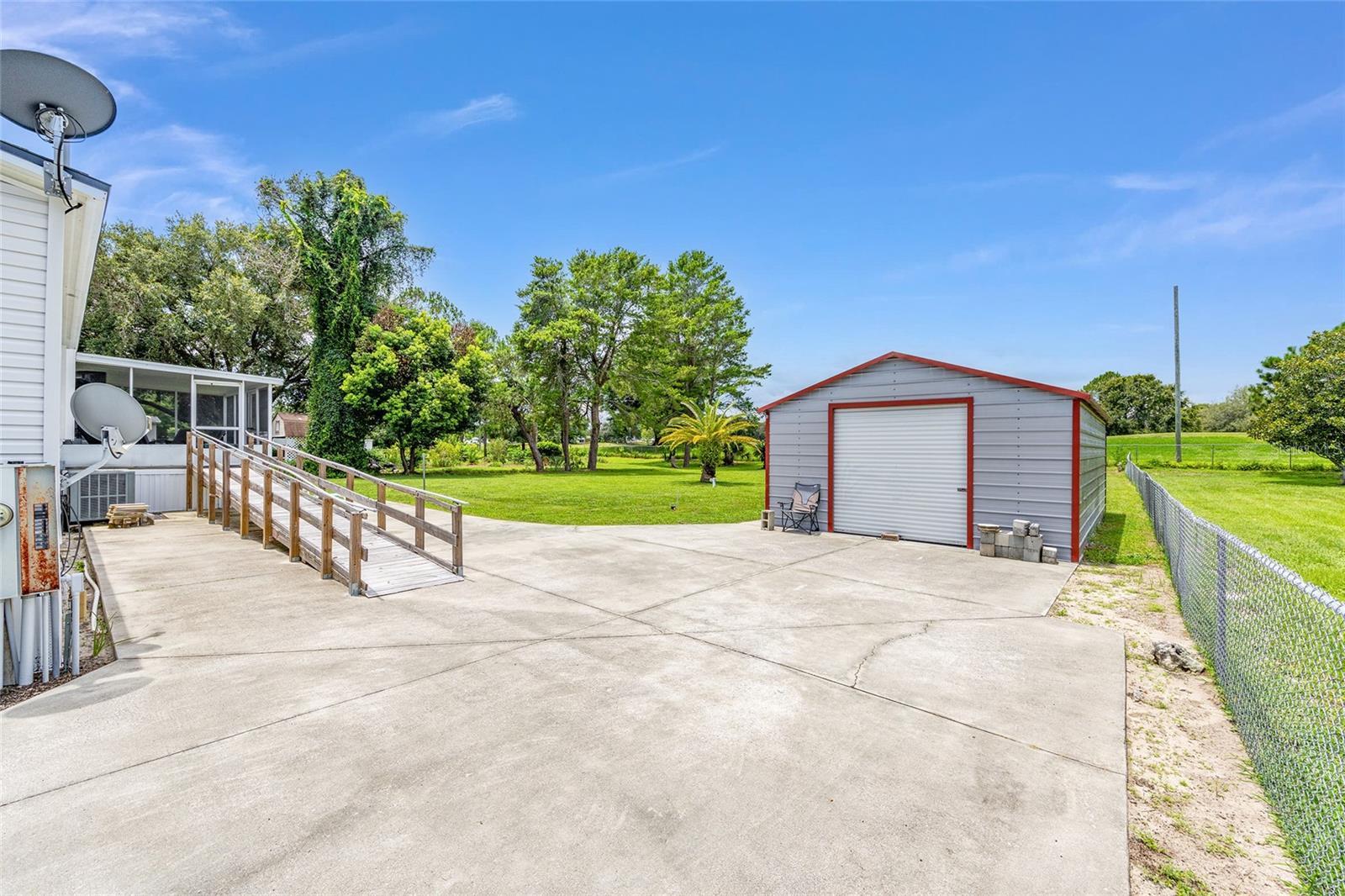 7706 COUNTY ROAD 109D, LADY LAKE, FL, 32159
