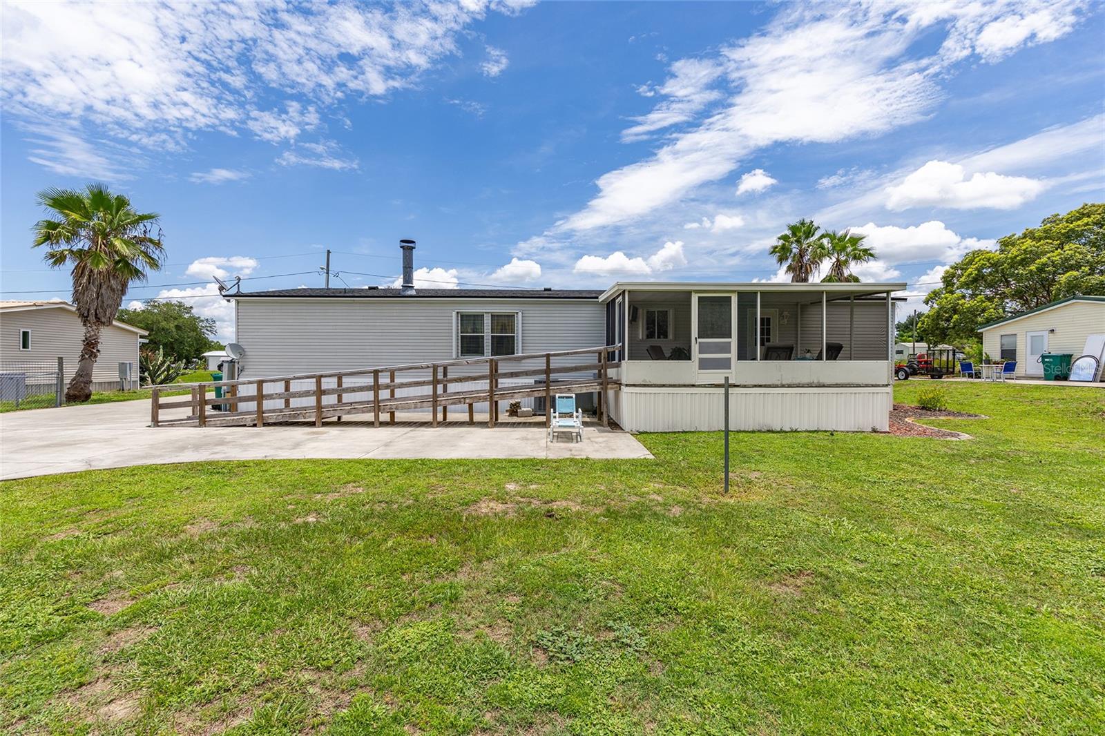 7706 COUNTY ROAD 109D, LADY LAKE, FL, 32159