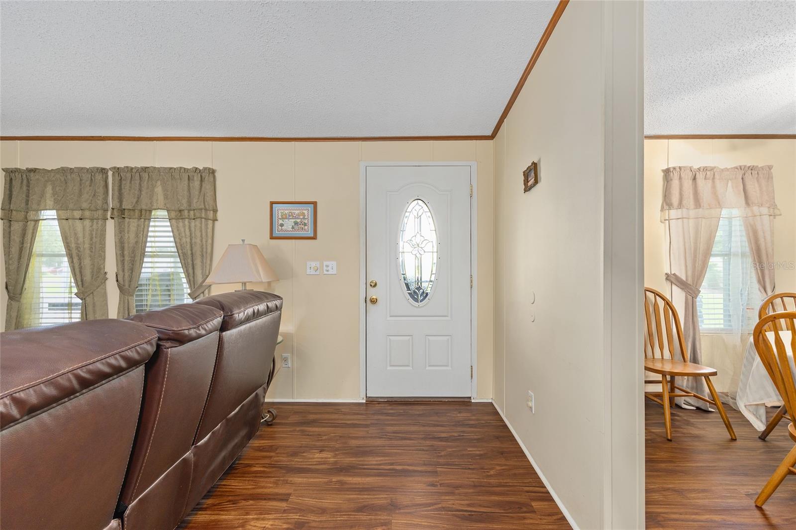 7706 COUNTY ROAD 109D, LADY LAKE, FL, 32159