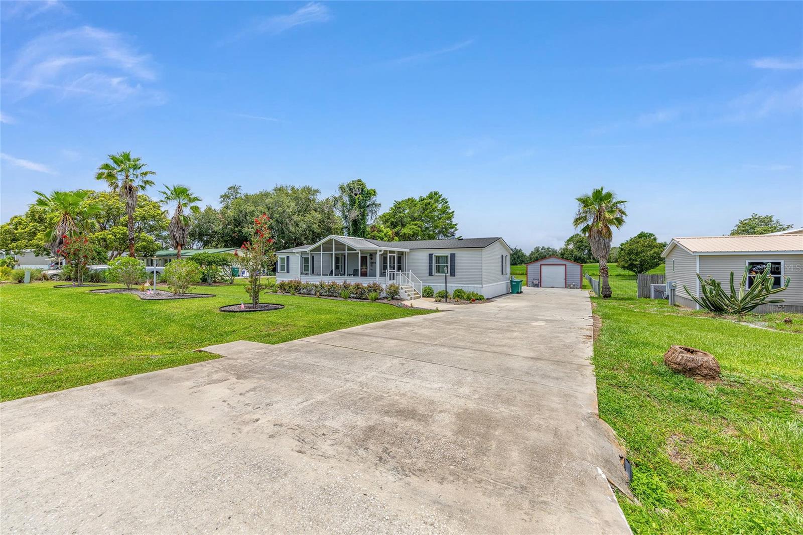 7706 COUNTY ROAD 109D, LADY LAKE, FL, 32159