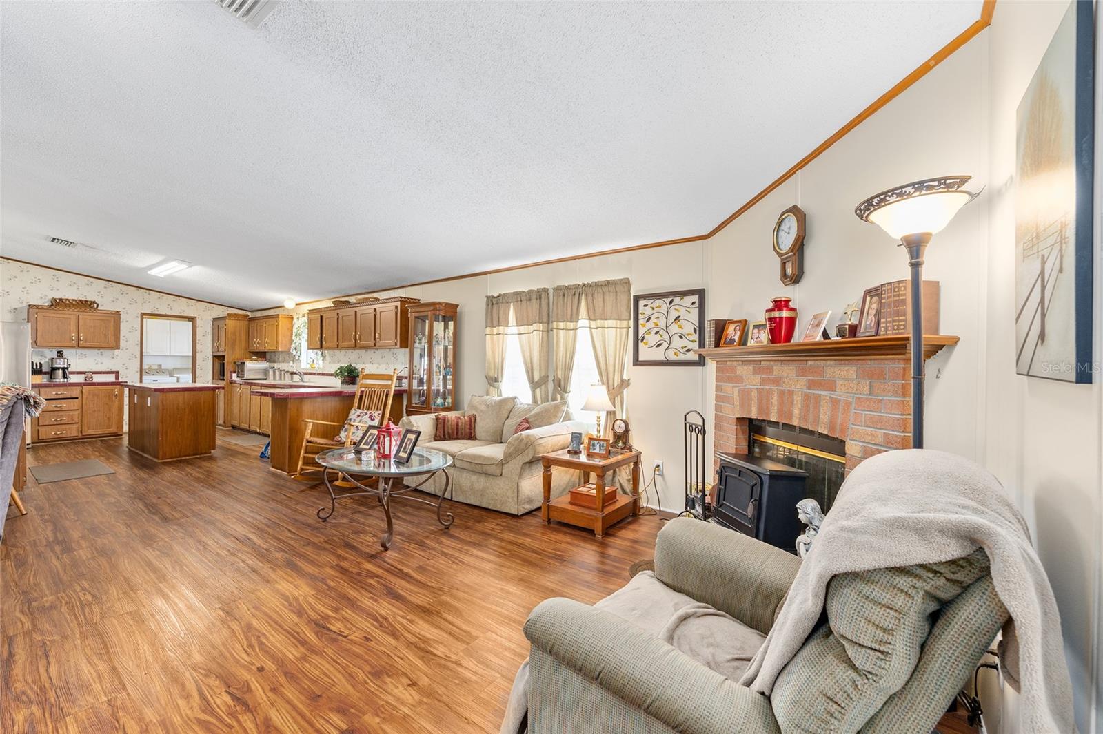 7706 COUNTY ROAD 109D, LADY LAKE, FL, 32159