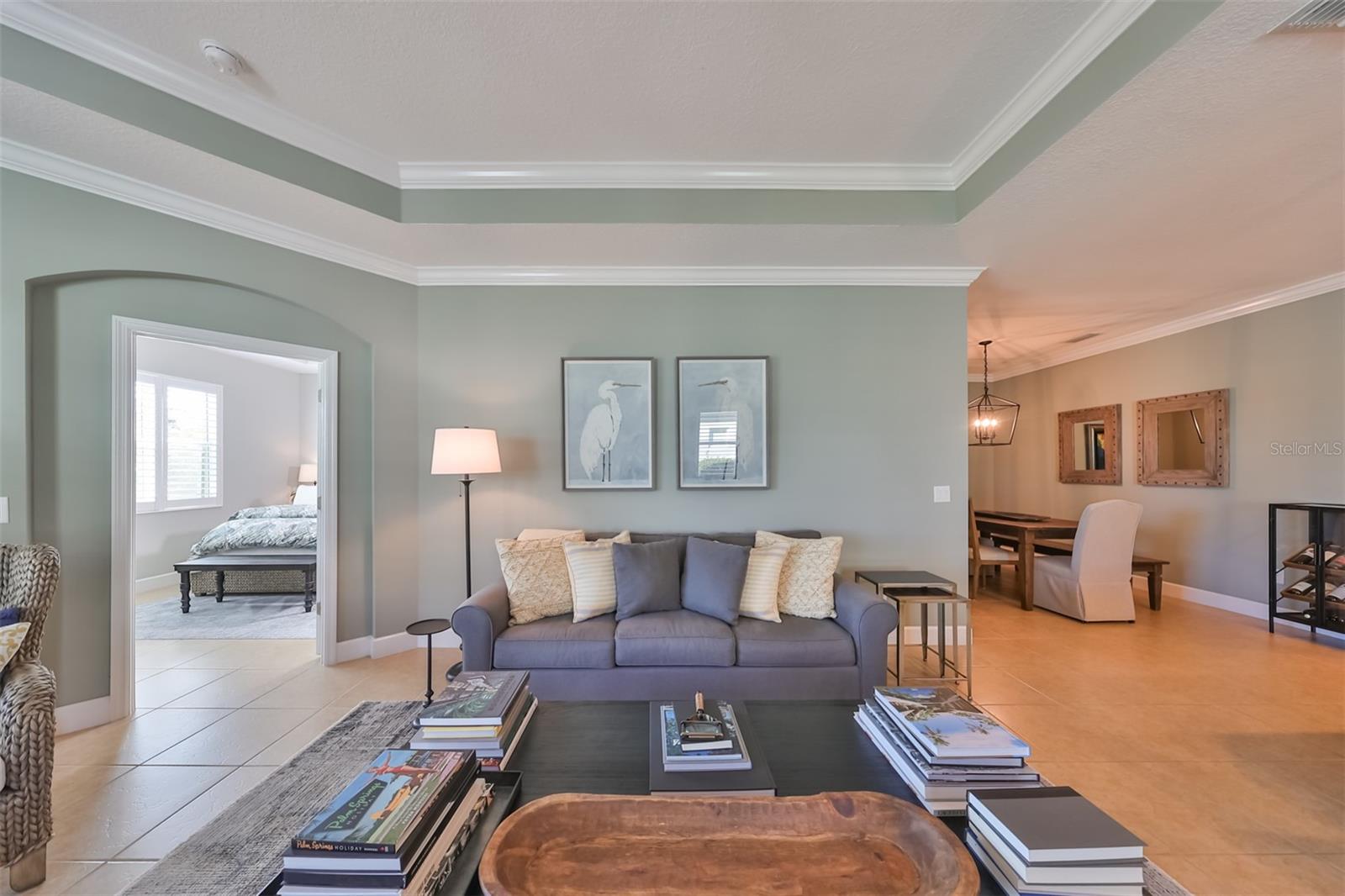 Notice how clean and ready this home is for its new owner.  The Owner's suite is to the left of the picture and the dining area is to the right.