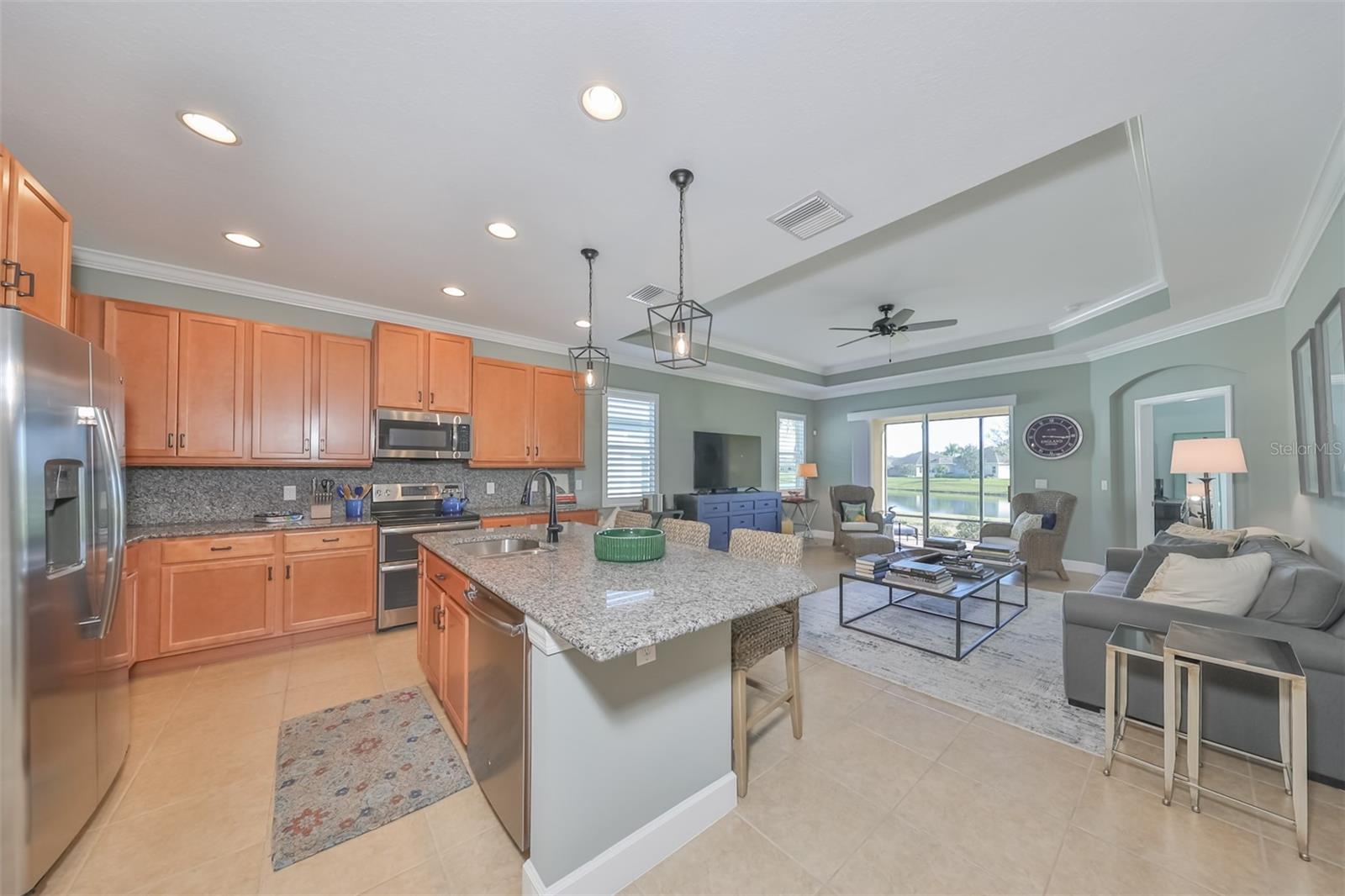 As you walk into the main living space, this sparkling clean villa, boasts an open floor plan with water views in all the rooms.  Enjoy cooking and entertaining, while being in the middle of everything.