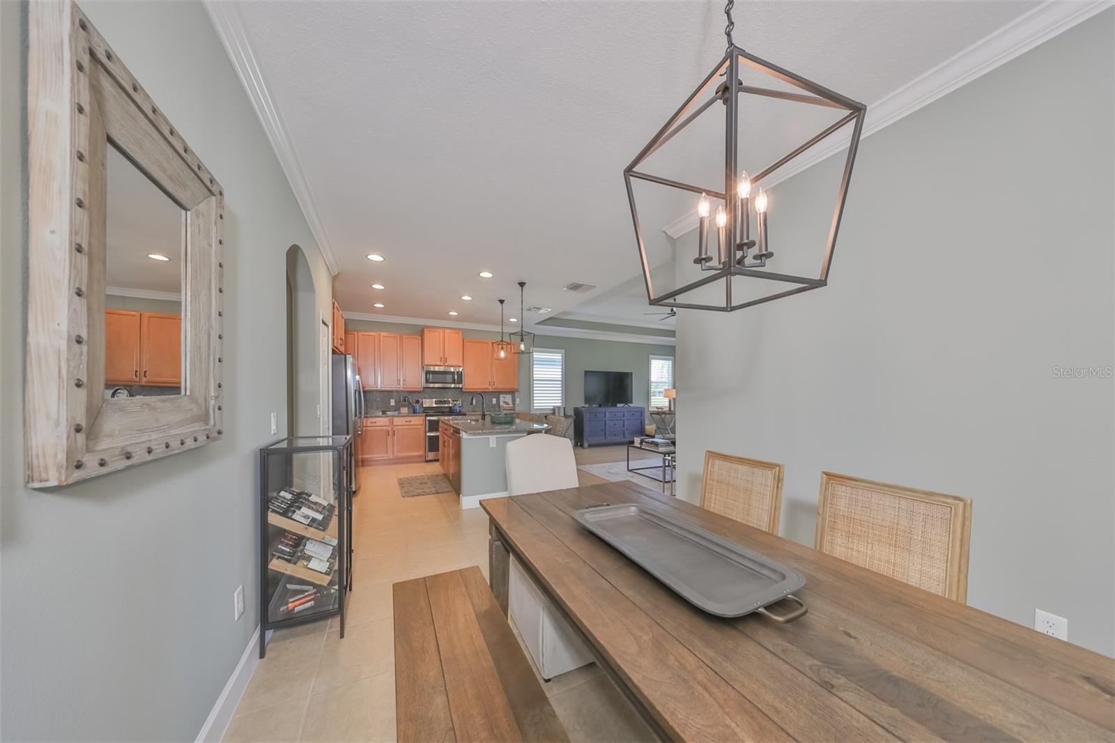 Easy access to the kitchen area and plenty of room for an 8-seater dining room table.