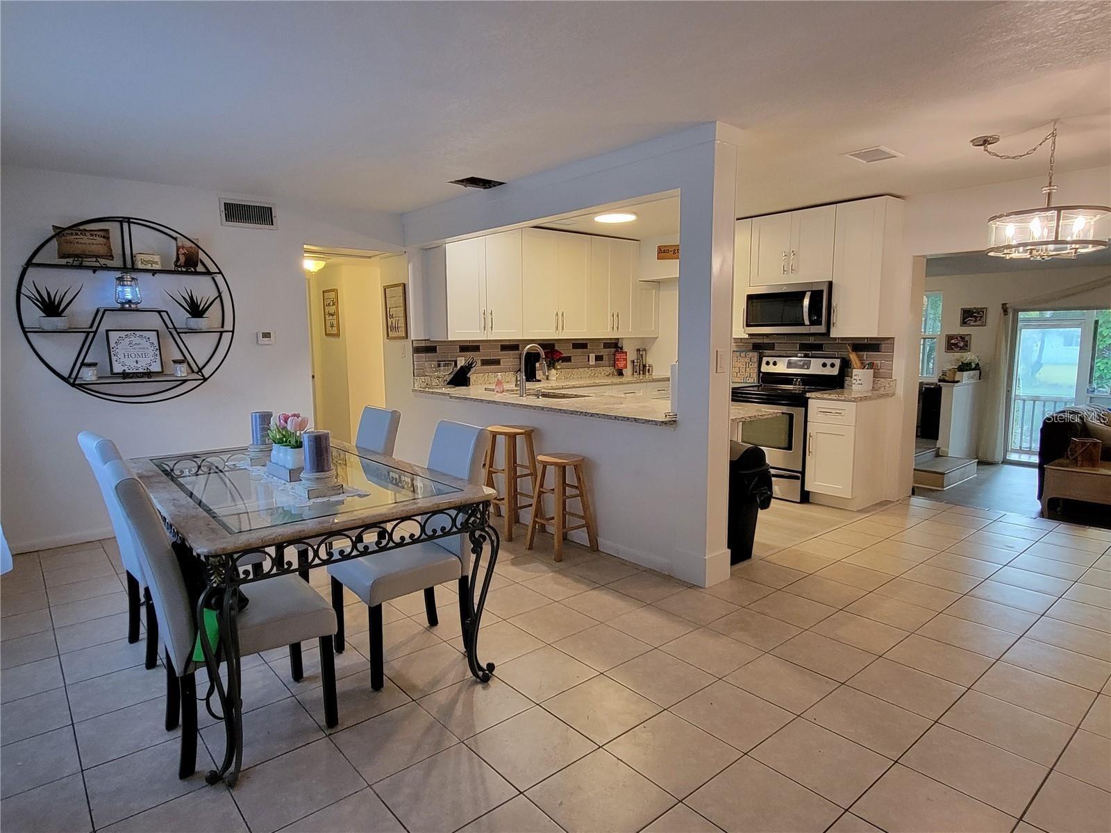 906 E WISCONSIN AVE, DELAND, FL, 32724